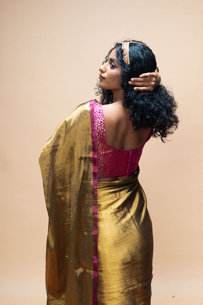 TAVYA I Gold Handwoven Tissue Saree with Dark Pink and Silver Striped Border
