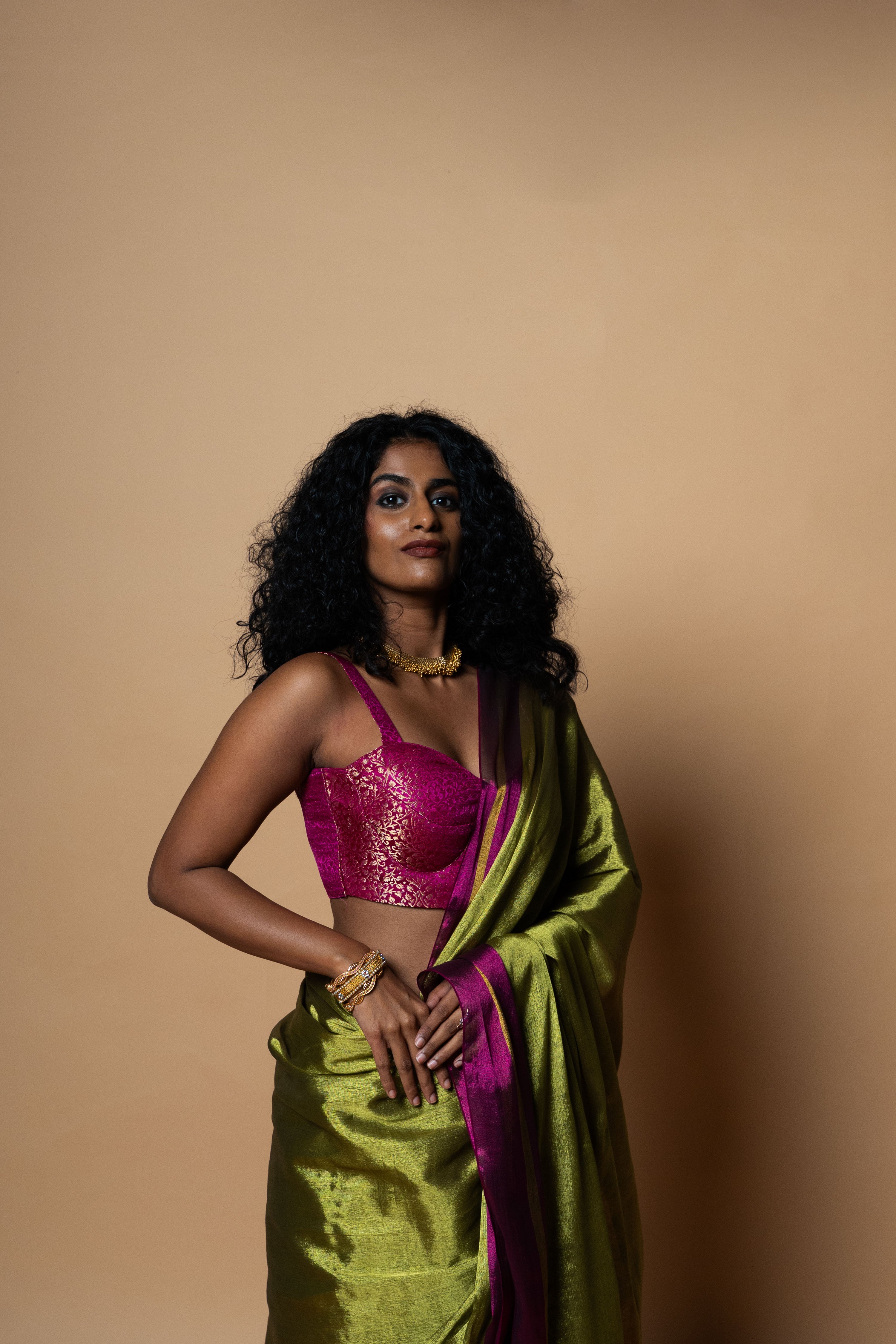 MUDRAYA I Lime Green Handwoven Tissue saree with pink and gold striped border