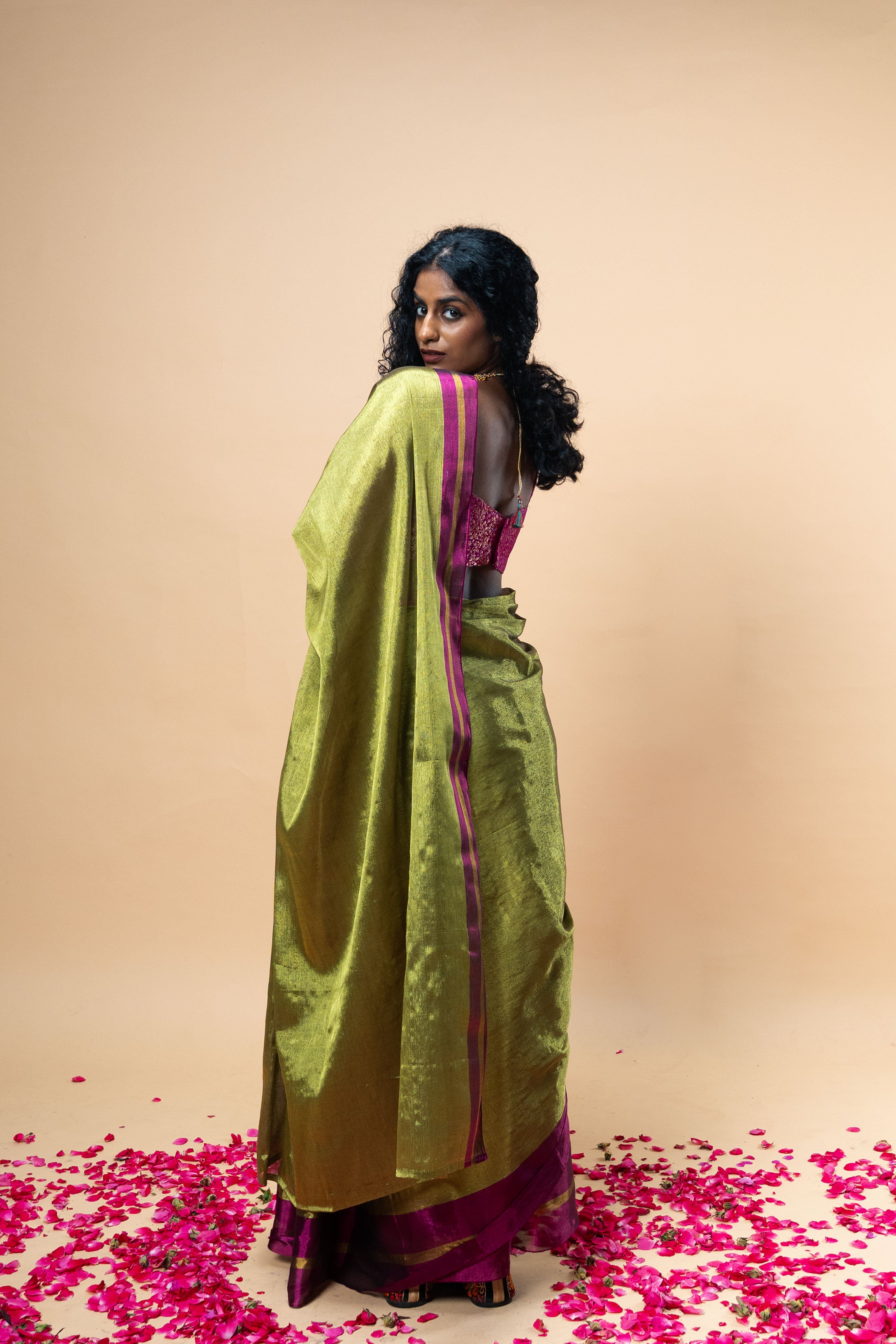 MUDRAYA I Lime Green Handwoven Tissue saree with pink and gold striped border