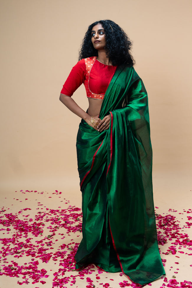RASHVI I Green handwoven tissue saree with red border