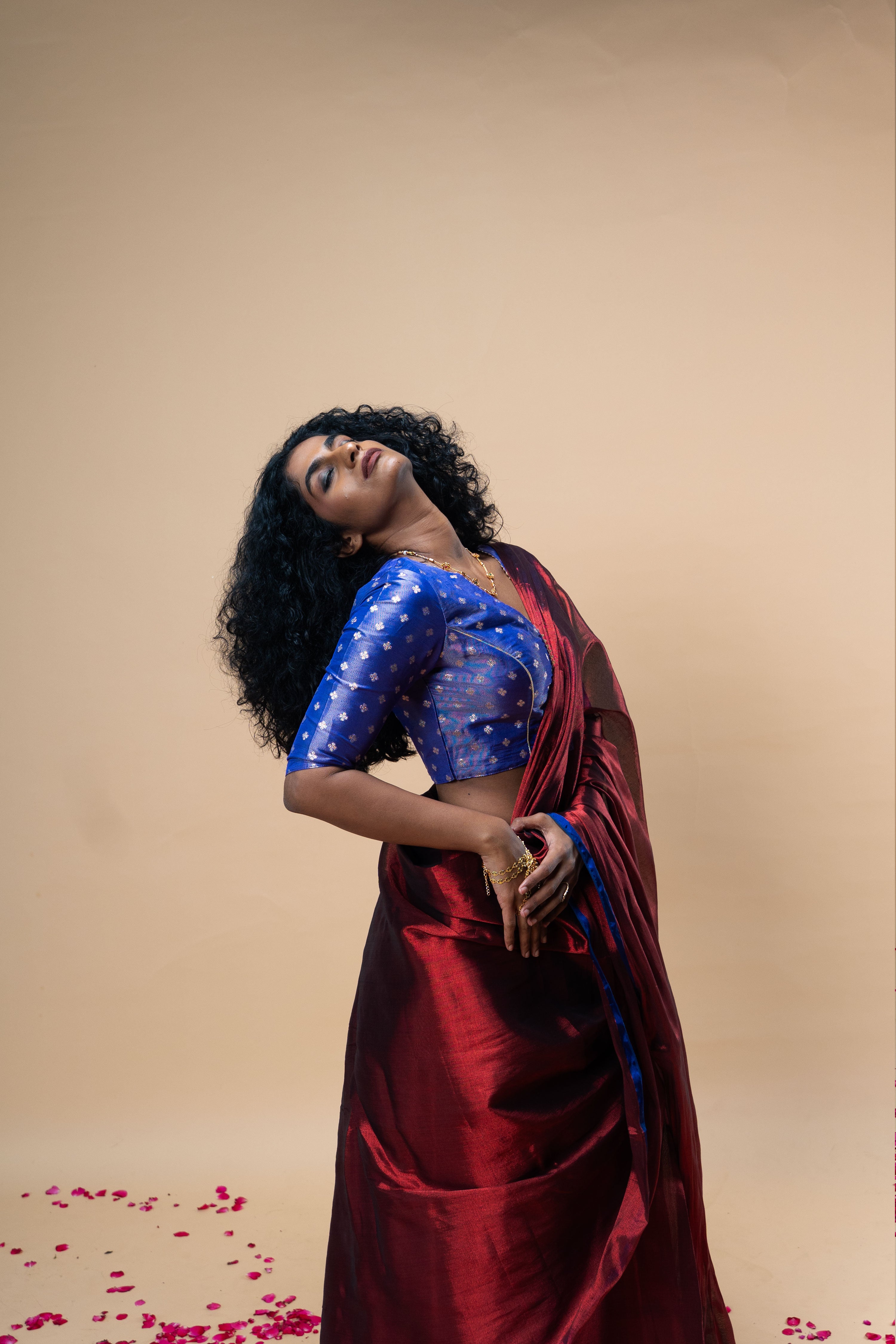 TANVYA I Red handwoven tissue saree with blue border