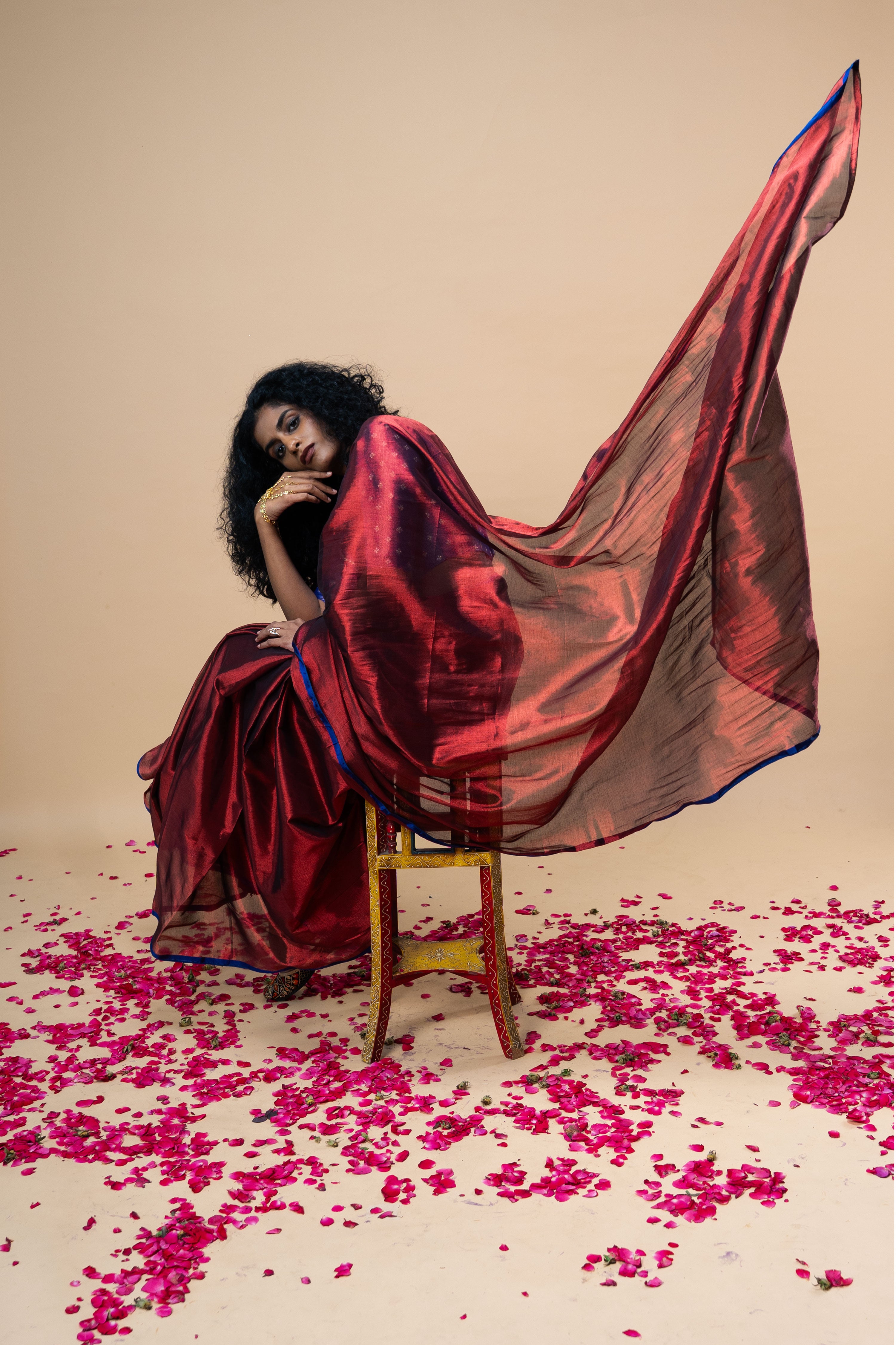 TANVYA I Red handwoven tissue saree with blue border
