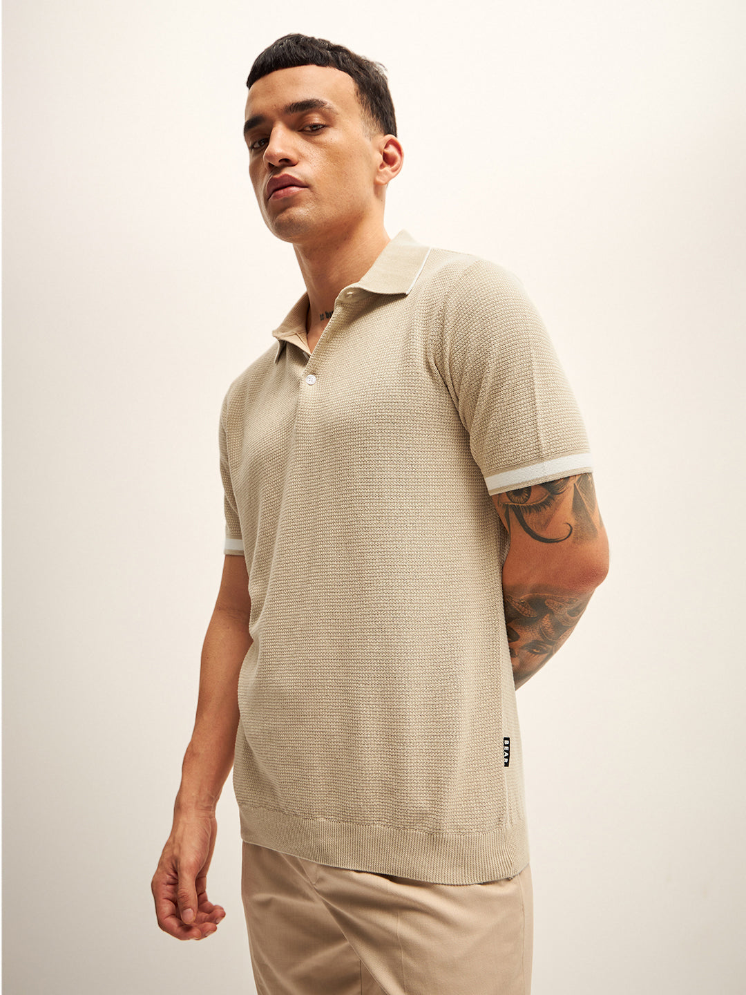 Men Beige Self Design Regular Fit Polo T-Shirt