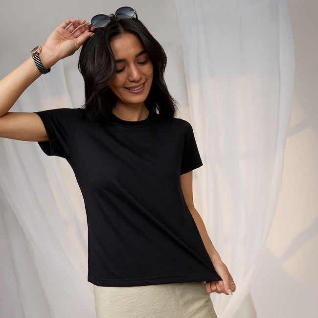 Women Black Solid Regular Fit Top