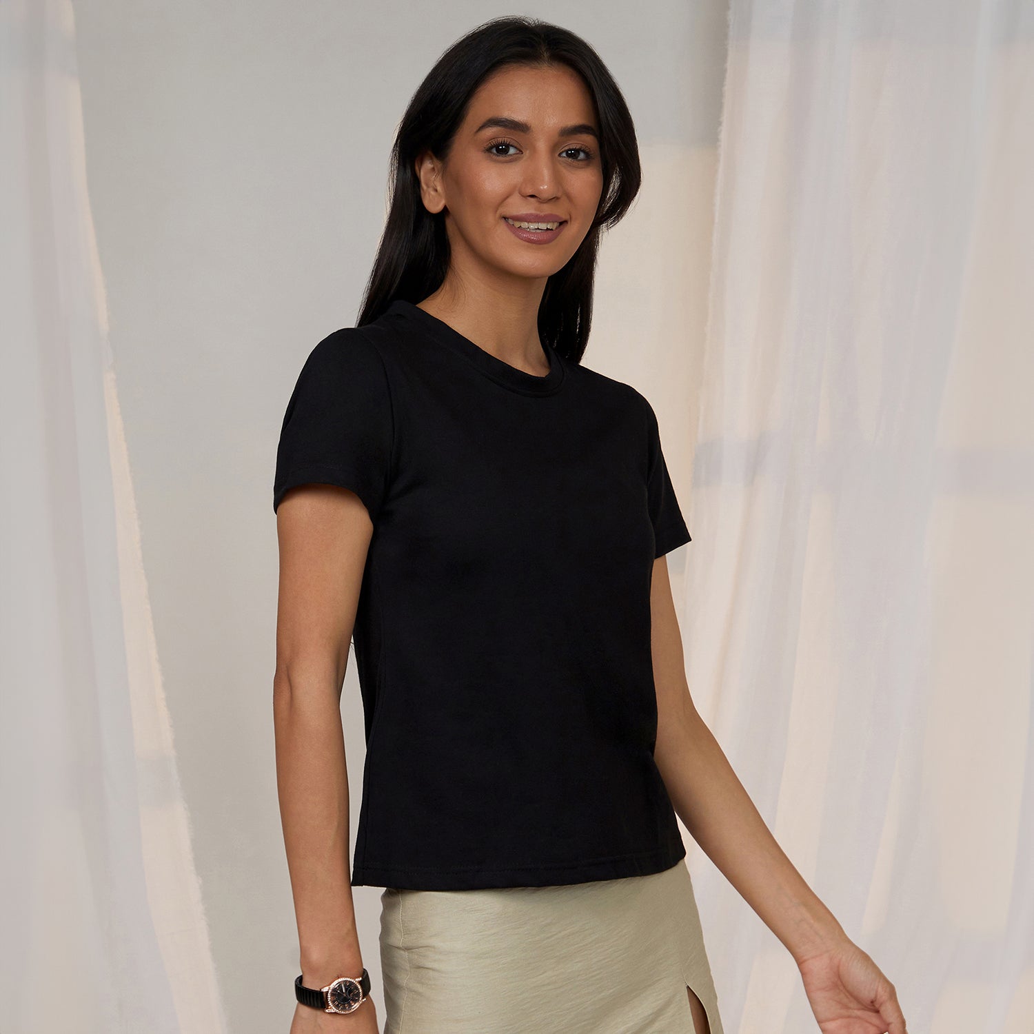 Women Black Solid Regular Fit Top