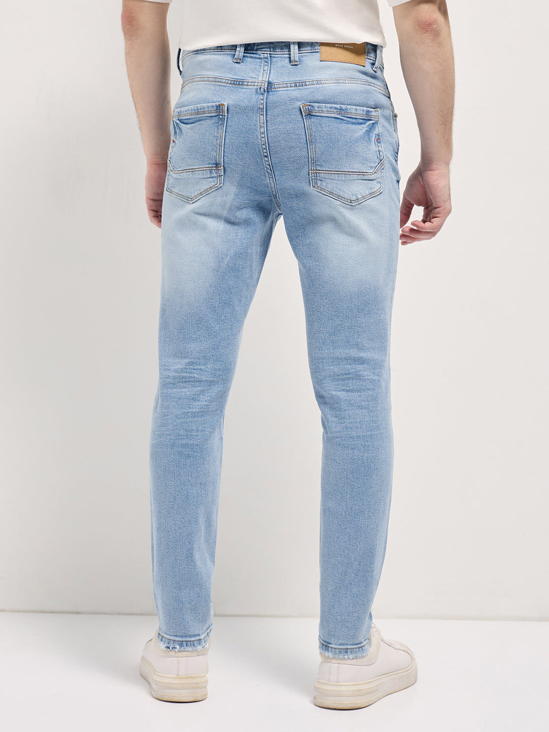 Men Light BlueLight Fade Distressed Patch Mid-Rise Relaxed Fit Jeans