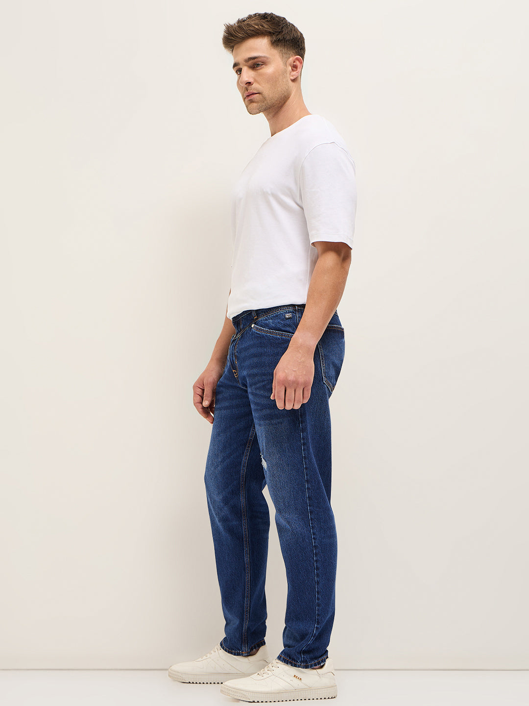 Men BlueLight Fade High Distressed Mid-Rise Relaxed Fit Jeans
