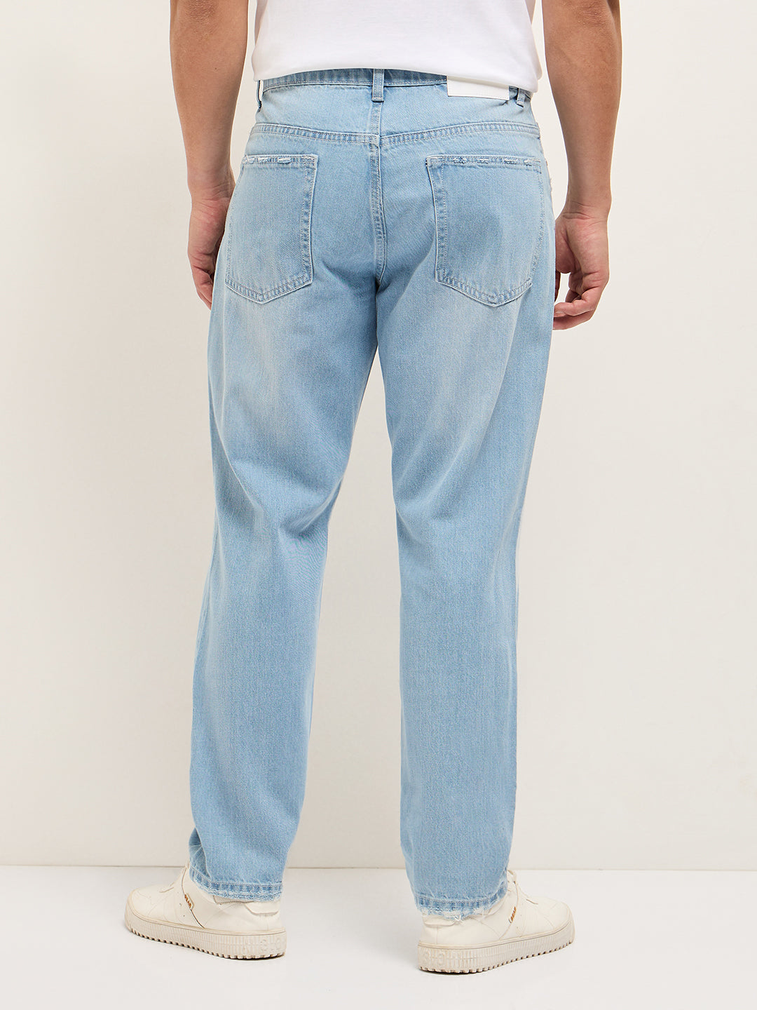 Men Light BlueLight Fade High Distressed Mid-Rise Relaxed Fit Jeans