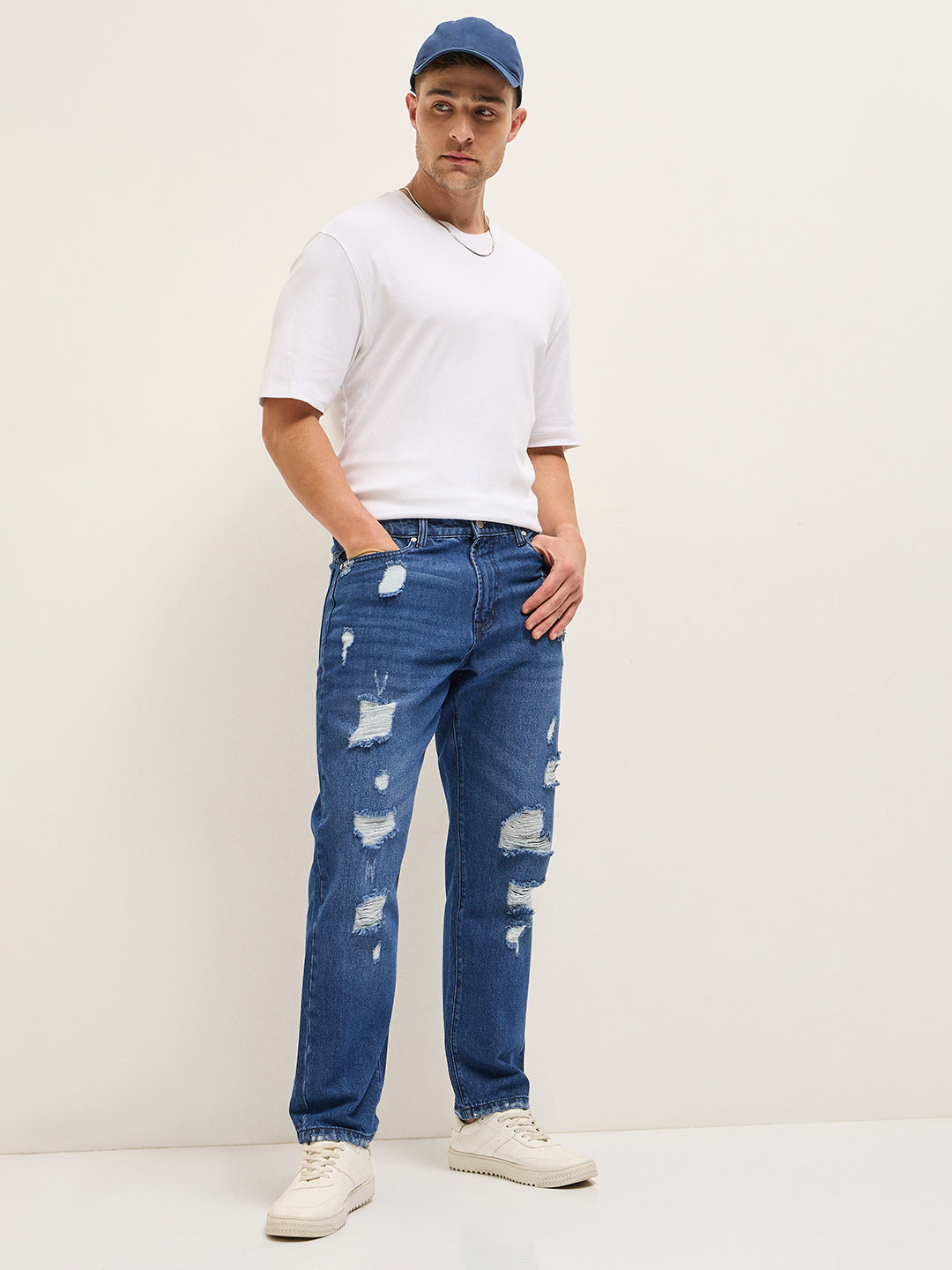 Men BlueLight Fade Distressed Mid-Rise Relaxed Fit Jeans