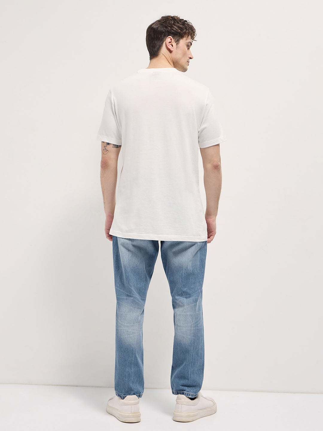 Men Light BlueLight Fade High Distressed Mid-Rise Relaxed Fit Jeans