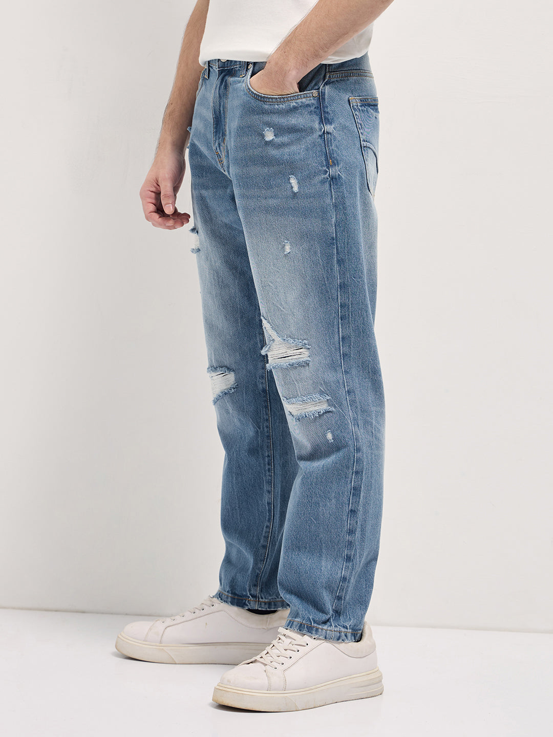 Men Light BlueLight Fade High Distressed Mid-Rise Relaxed Fit Jeans