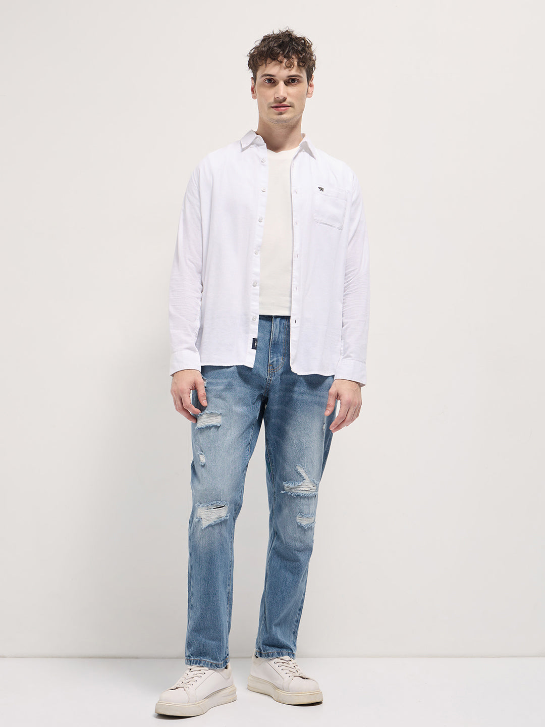 Men Light BlueLight Fade High Distressed Mid-Rise Relaxed Fit Jeans