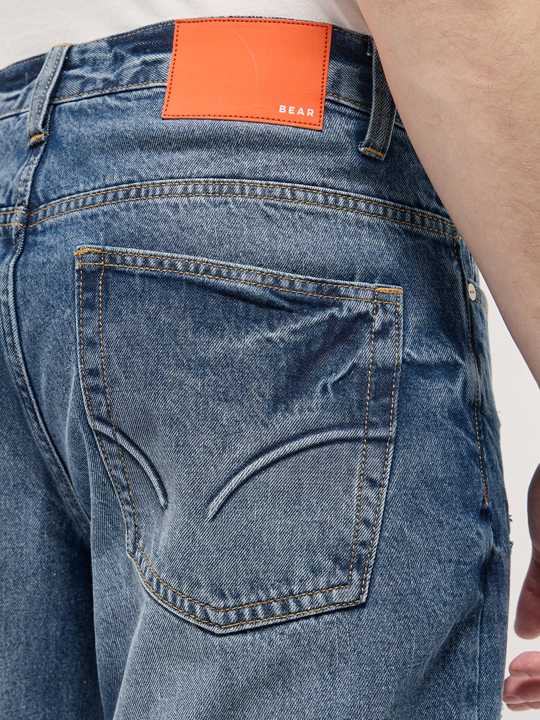 Men Mid BlueLight Fade High Distressed Mid-Rise Relaxed Fit Jeans