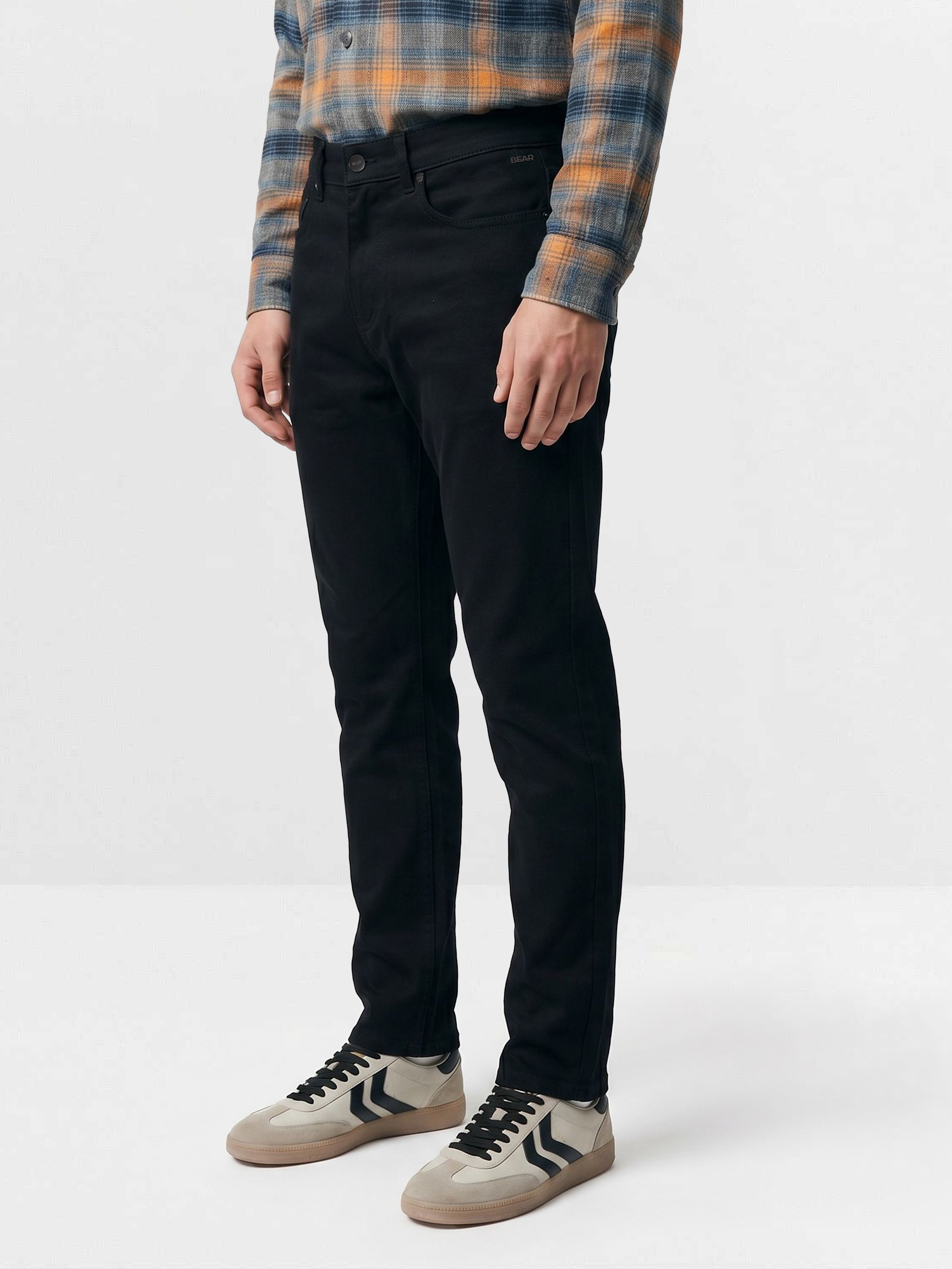 Men Black Solid Mid Rise Jeans