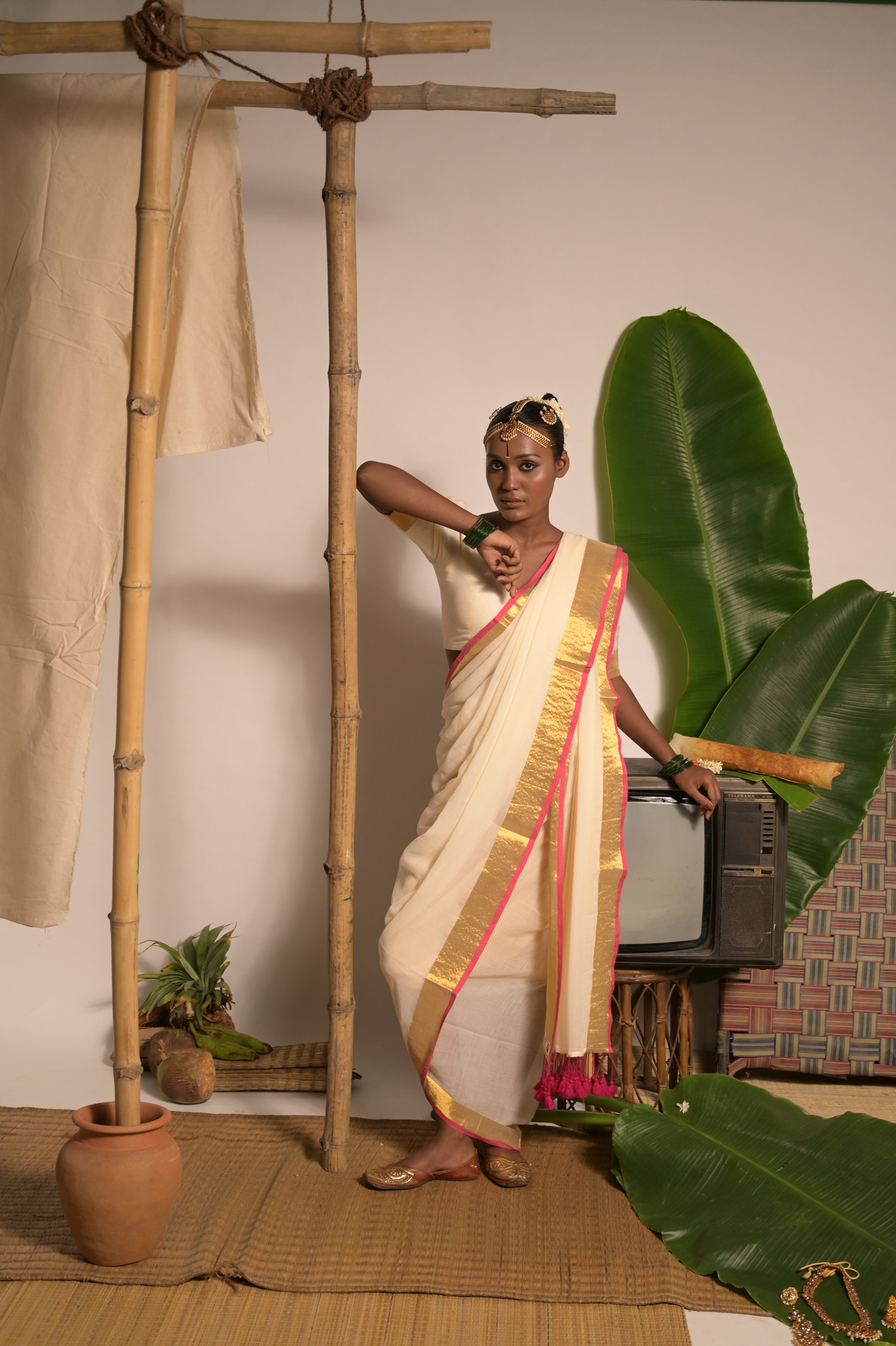 Chandralekha Off white mul cotton handwoven saree with golden and pink border