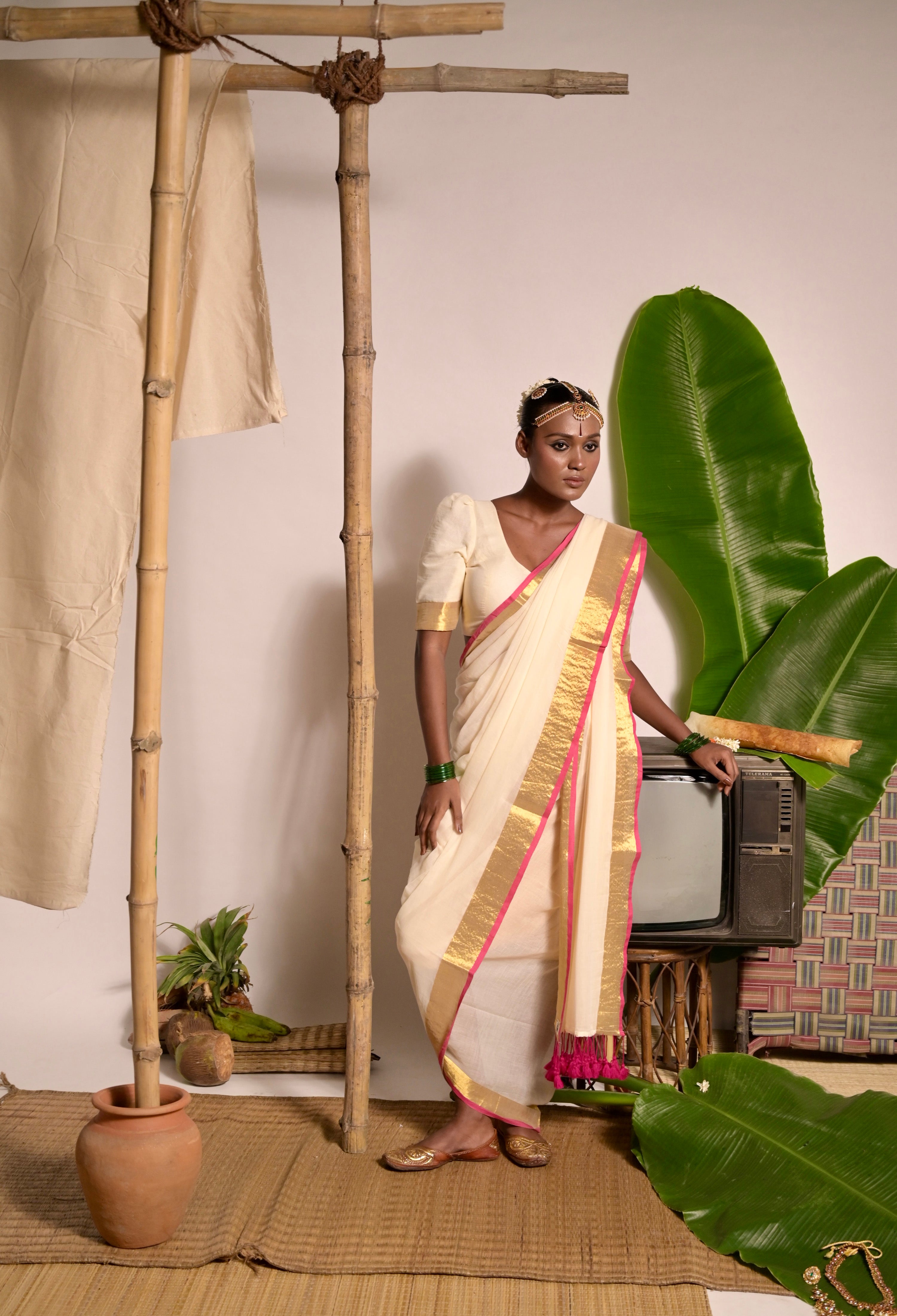 Chandralekha Off white mul cotton handwoven saree with golden and pink border