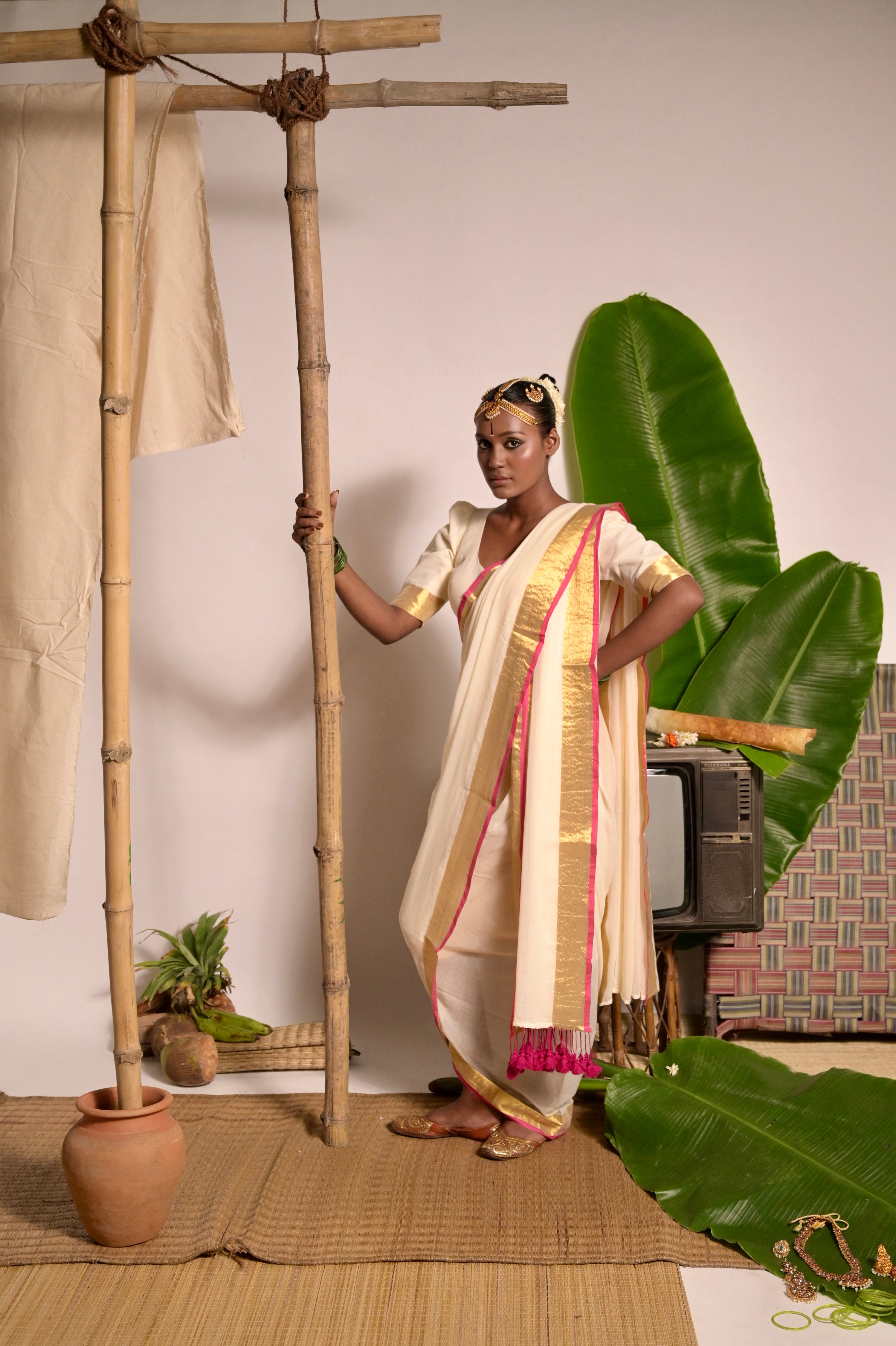 Chandralekha Off white mul cotton handwoven saree with golden and pink border