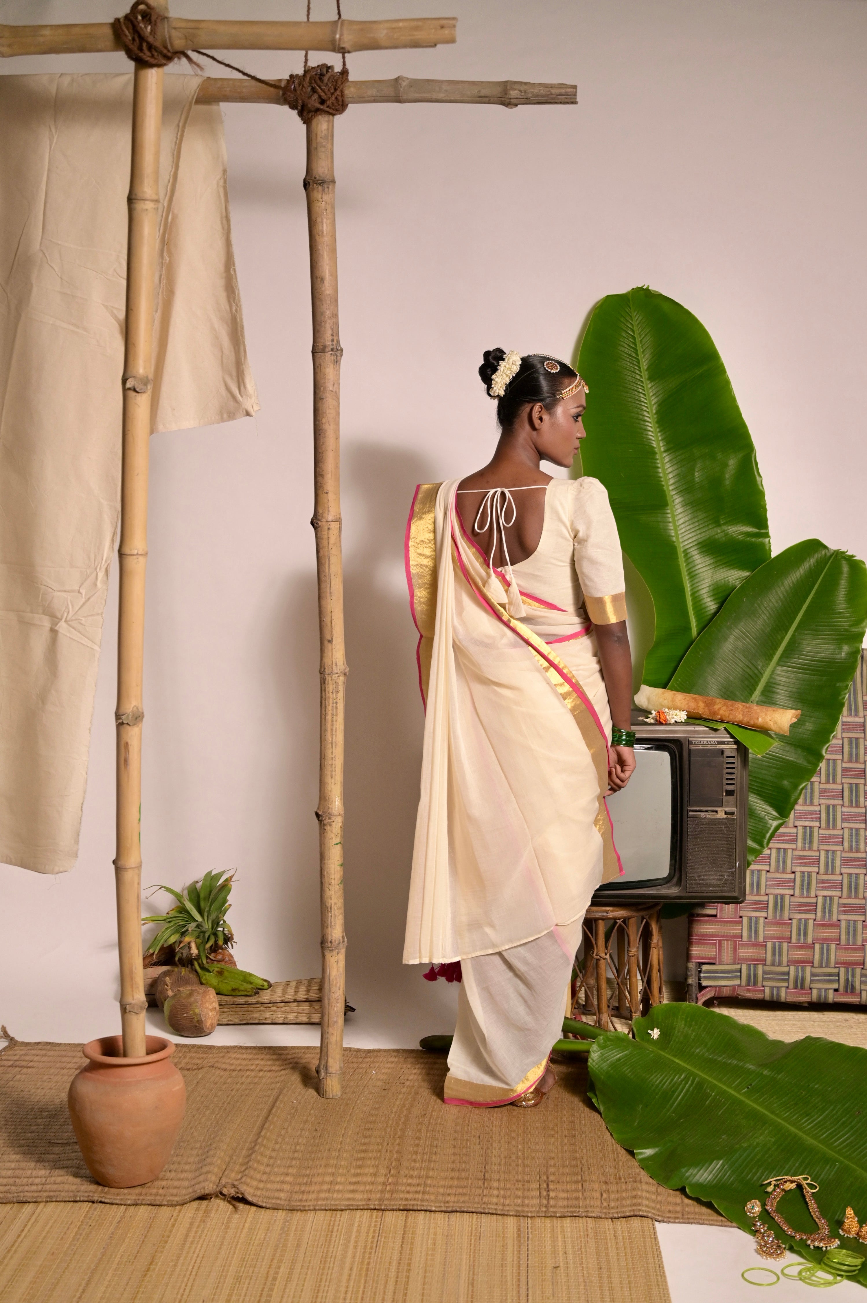 Chandralekha Off white mul cotton handwoven saree with golden and pink border