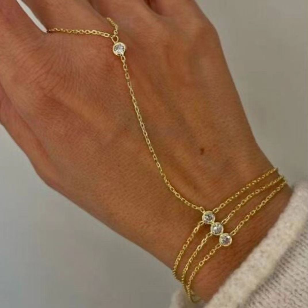 Gold Triple-Strand Crystal Hand Bracelet