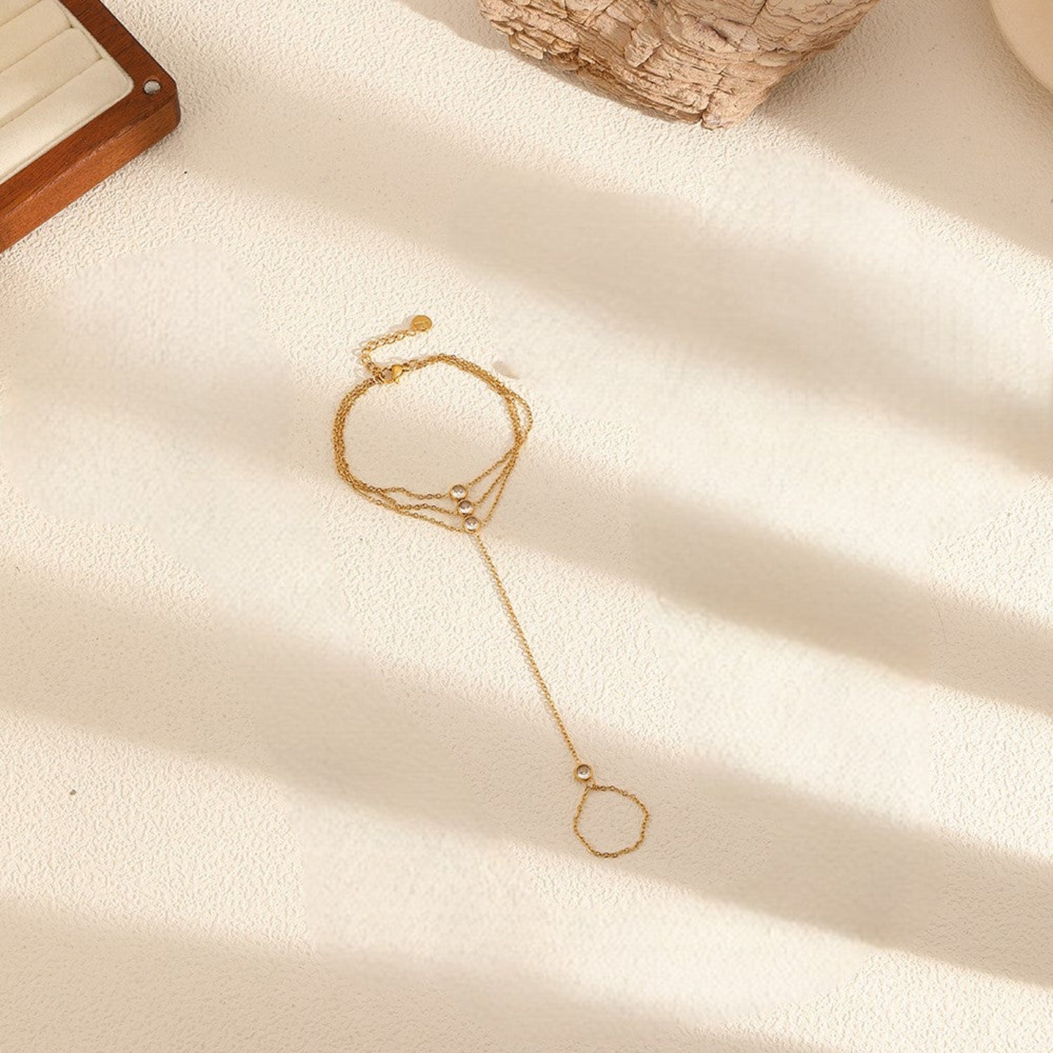 Gold Triple-Strand Crystal Hand Bracelet