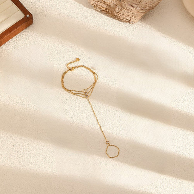 Gold Triple-Strand Crystal Hand Bracelet