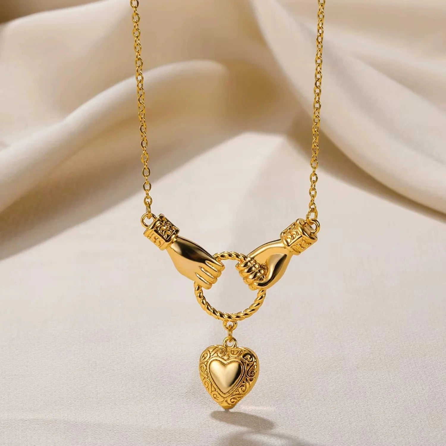 Gold Heart Hands Necklace
