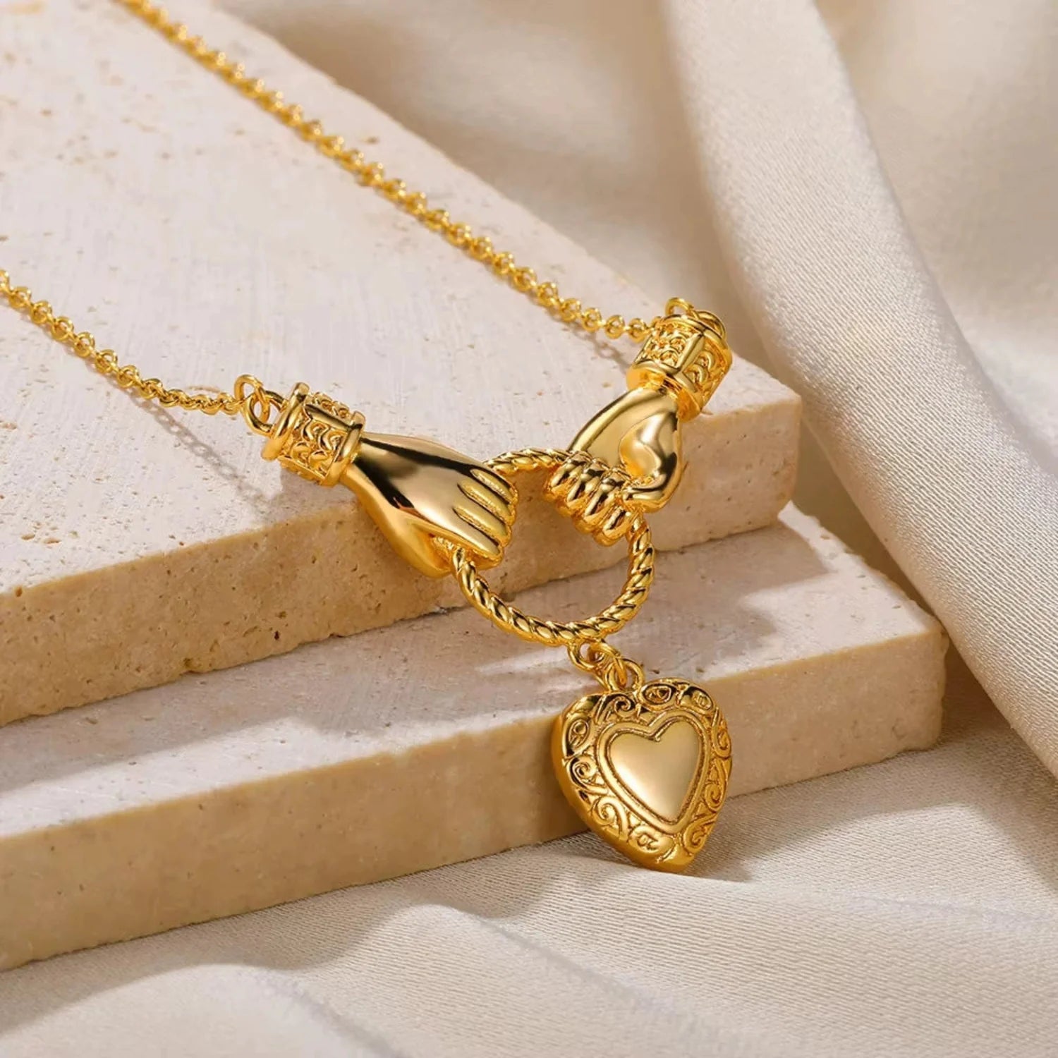 Gold Heart Hands Necklace