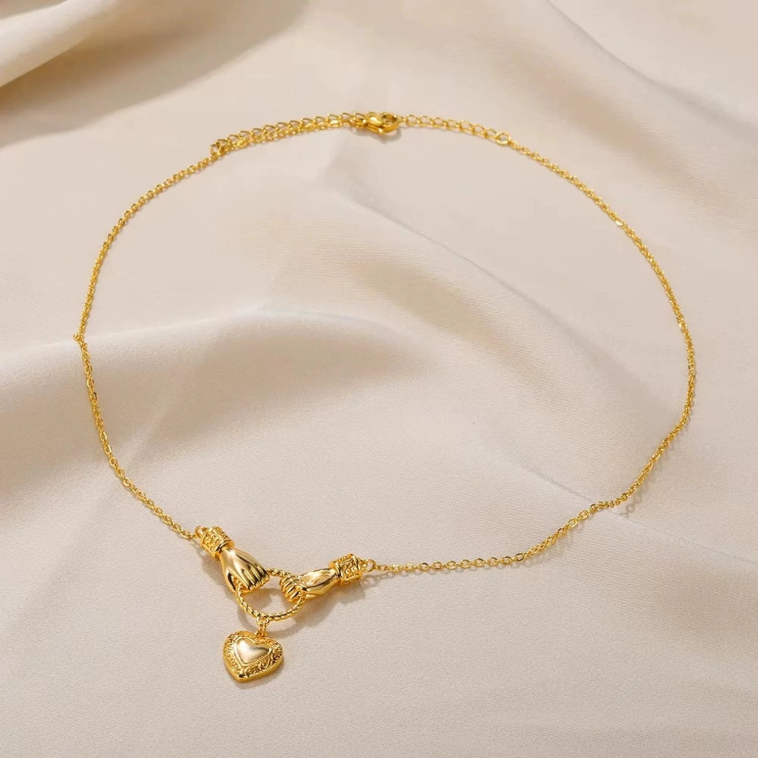 Gold Heart Hands Necklace