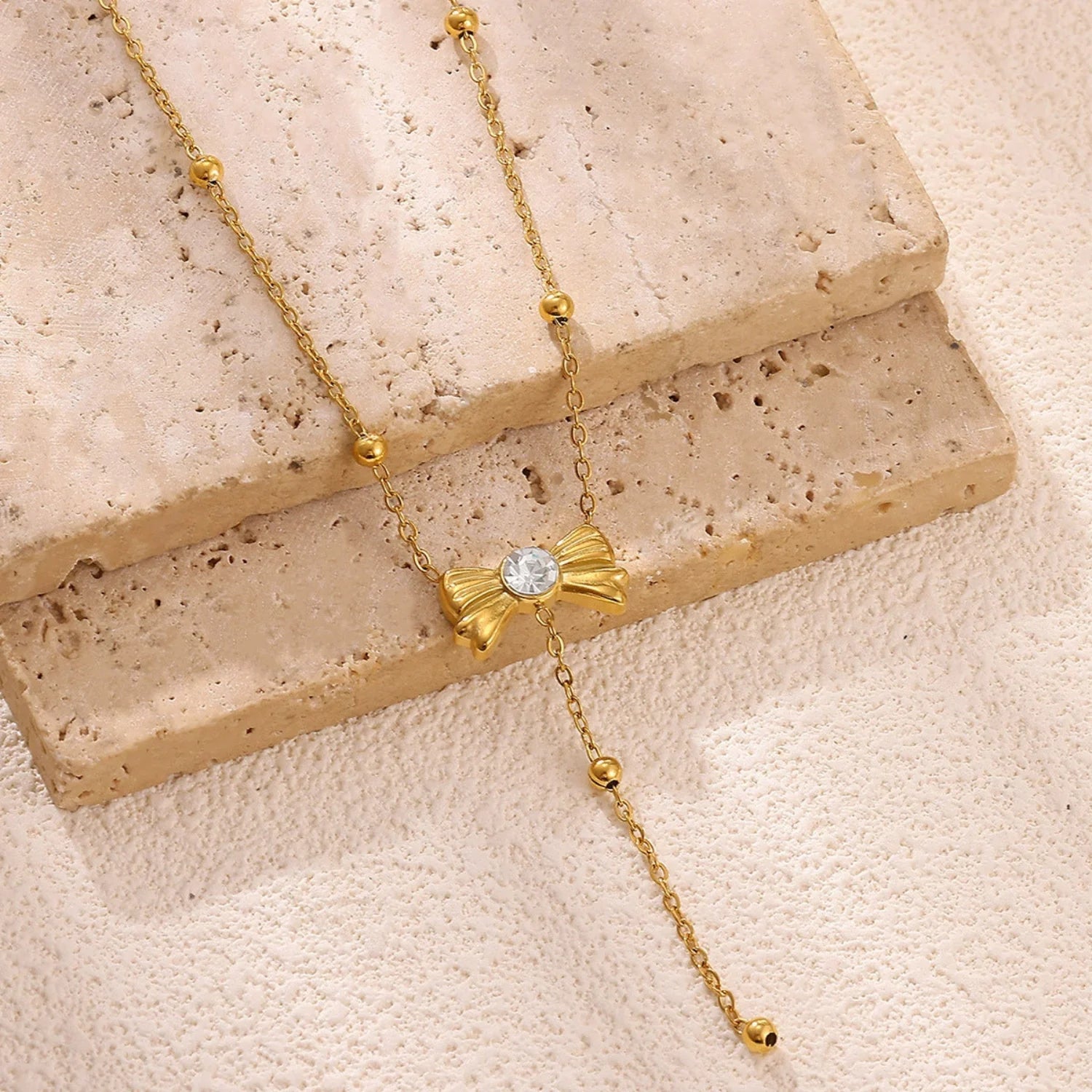 Gold Beaded Bow Crystal Necklace