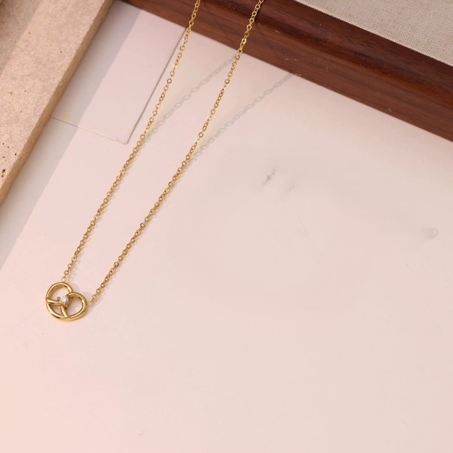 Gold Pretzel Knot Crystal Necklace