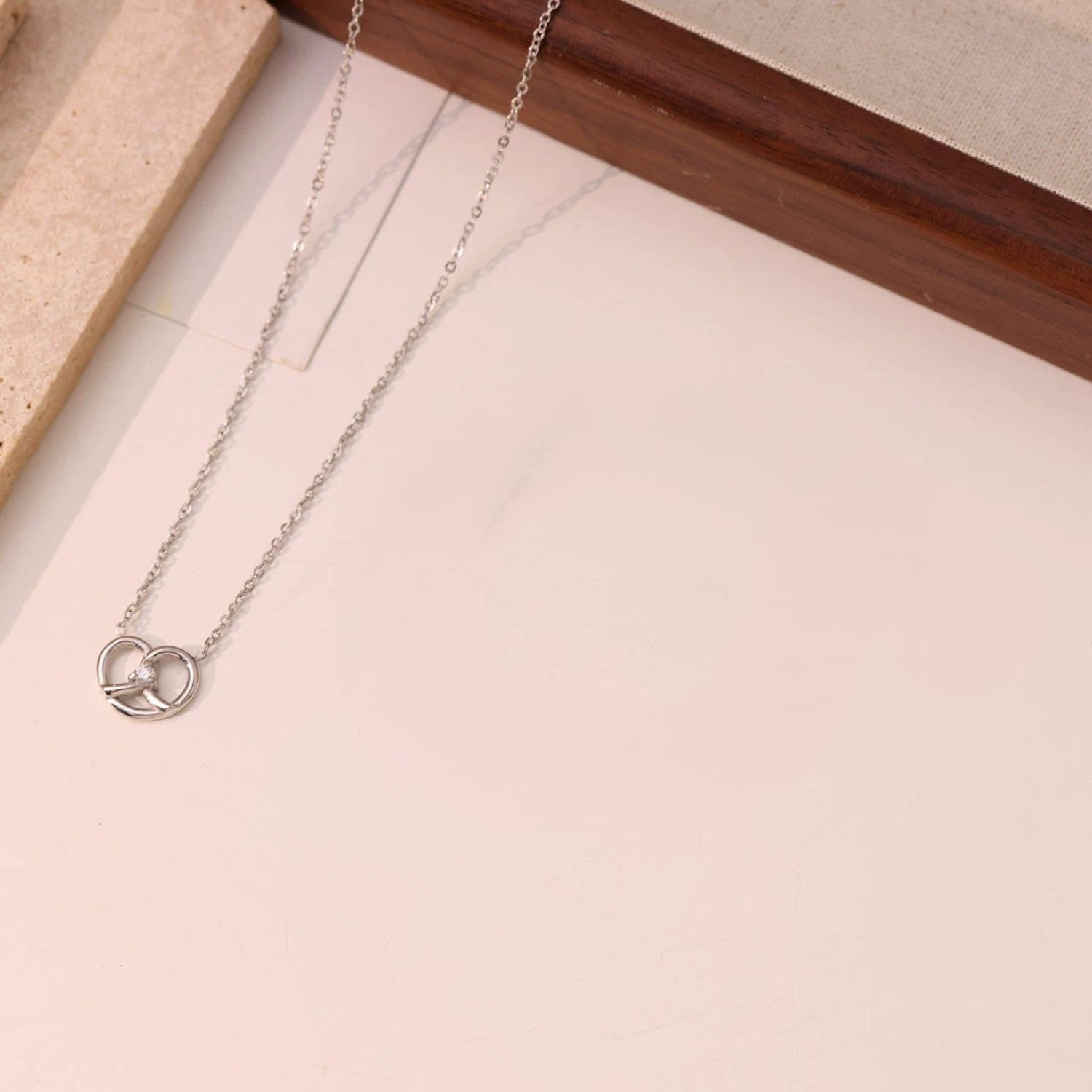 Silver Pretzel Knot Crystal Necklace