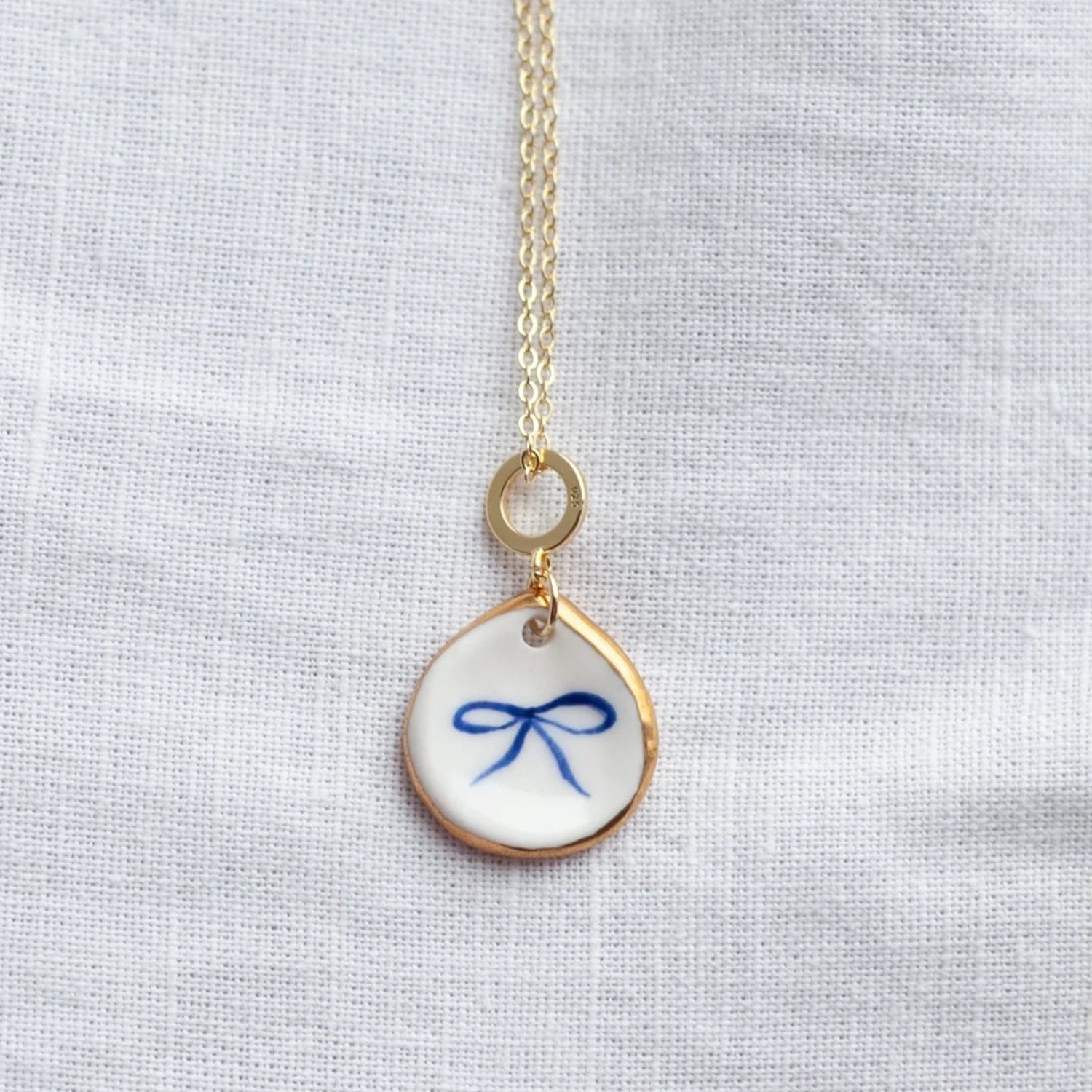 Gold Ribbon Bow Teardrop Necklace