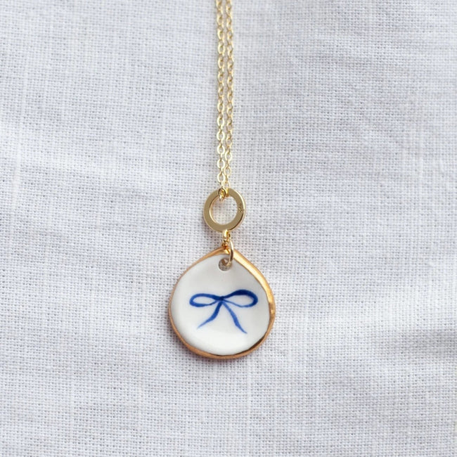 Gold Ribbon Bow Teardrop Necklace
