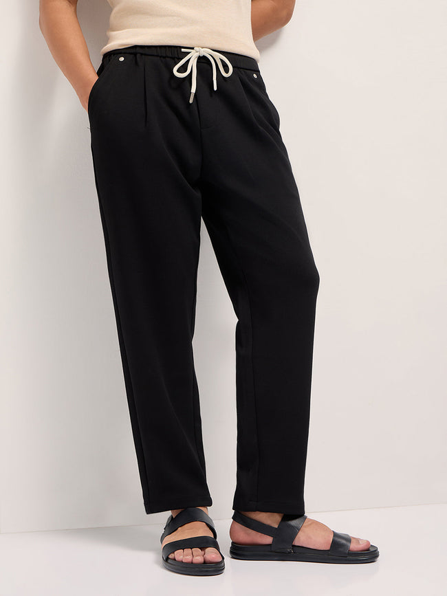 Men Black Solid Regular Fit Casual Trousers