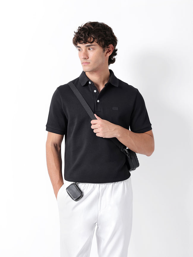Men Black Solid Cotton Polo