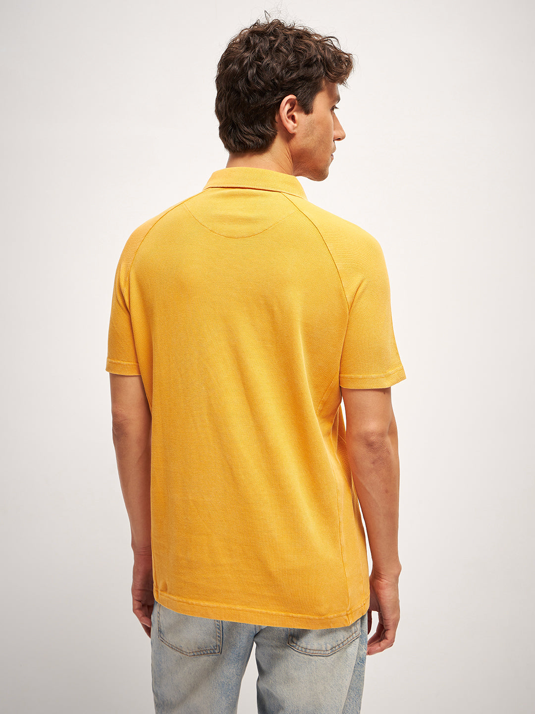 Men Orange Self Design Regular Fit Polo Collar T-shirt