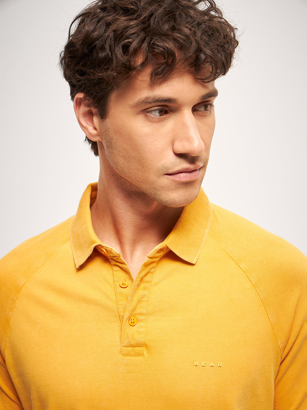 Men Orange Self Design Regular Fit Polo Collar T-shirt