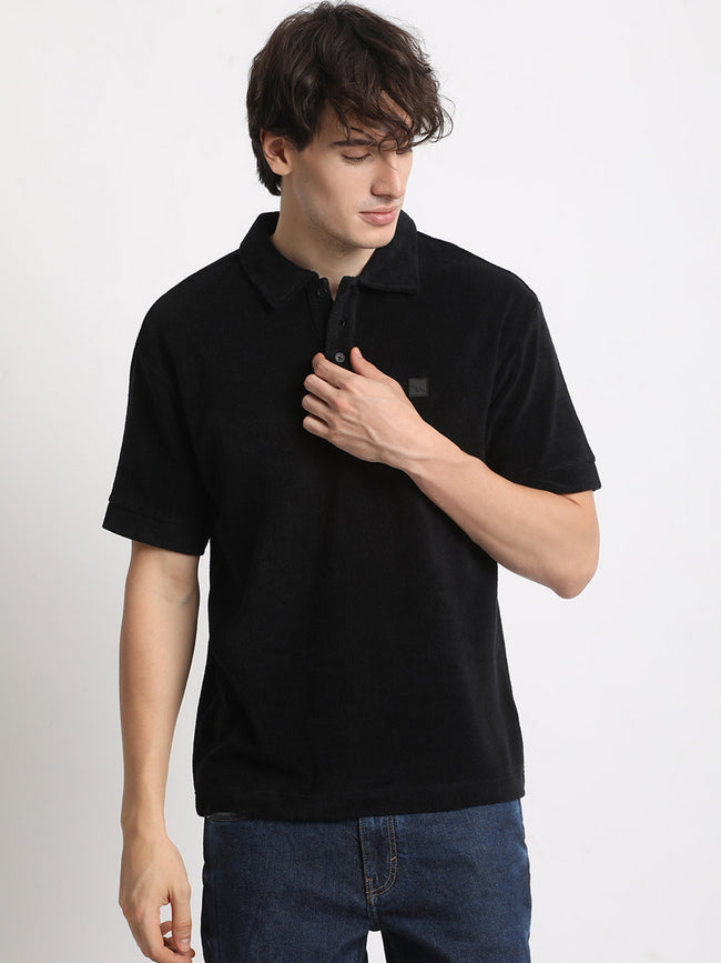 Men  Black Solid Relaxed Fit Polo T-shirt