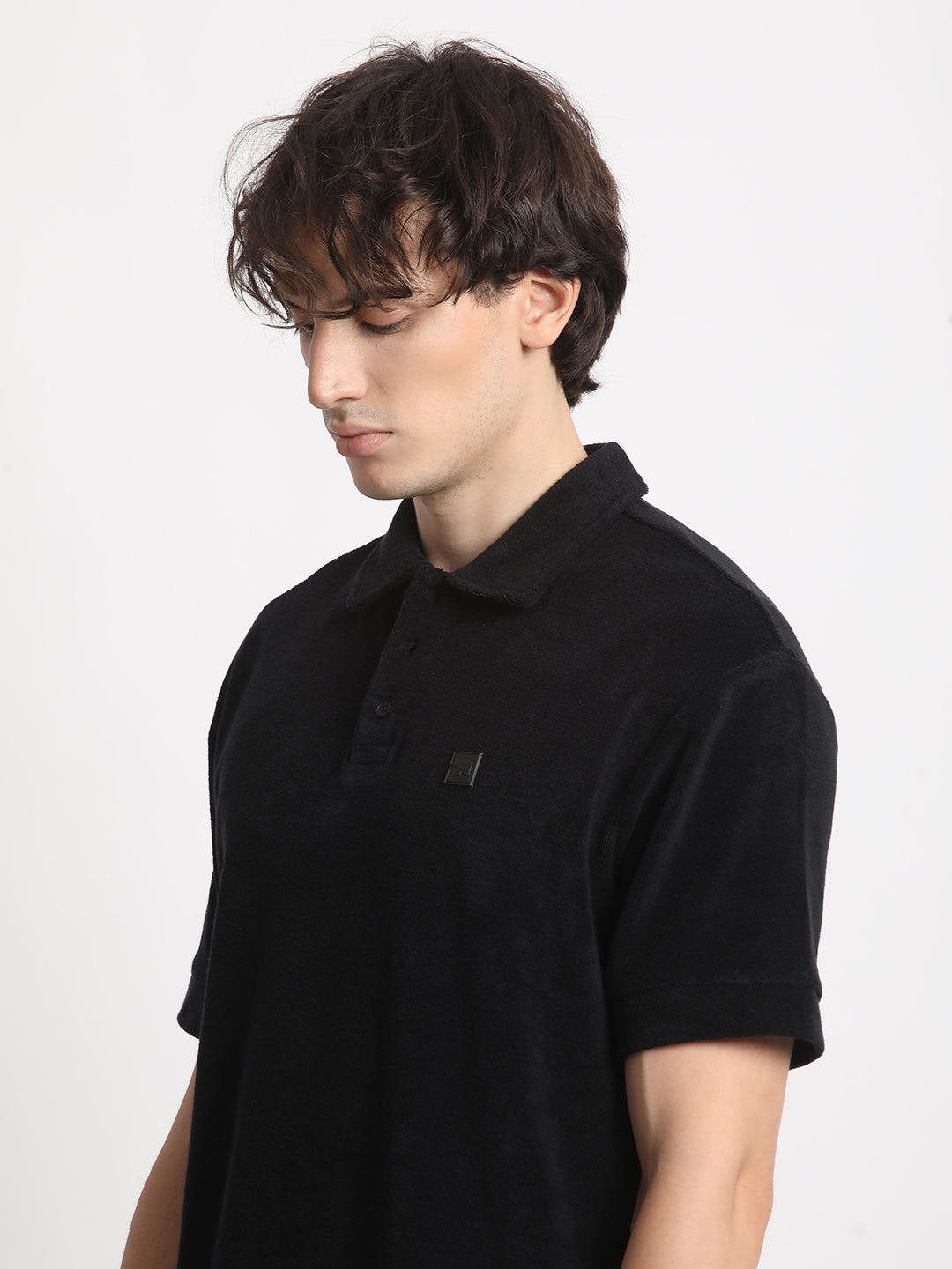 Men  Black Solid Relaxed Fit Polo T-shirt