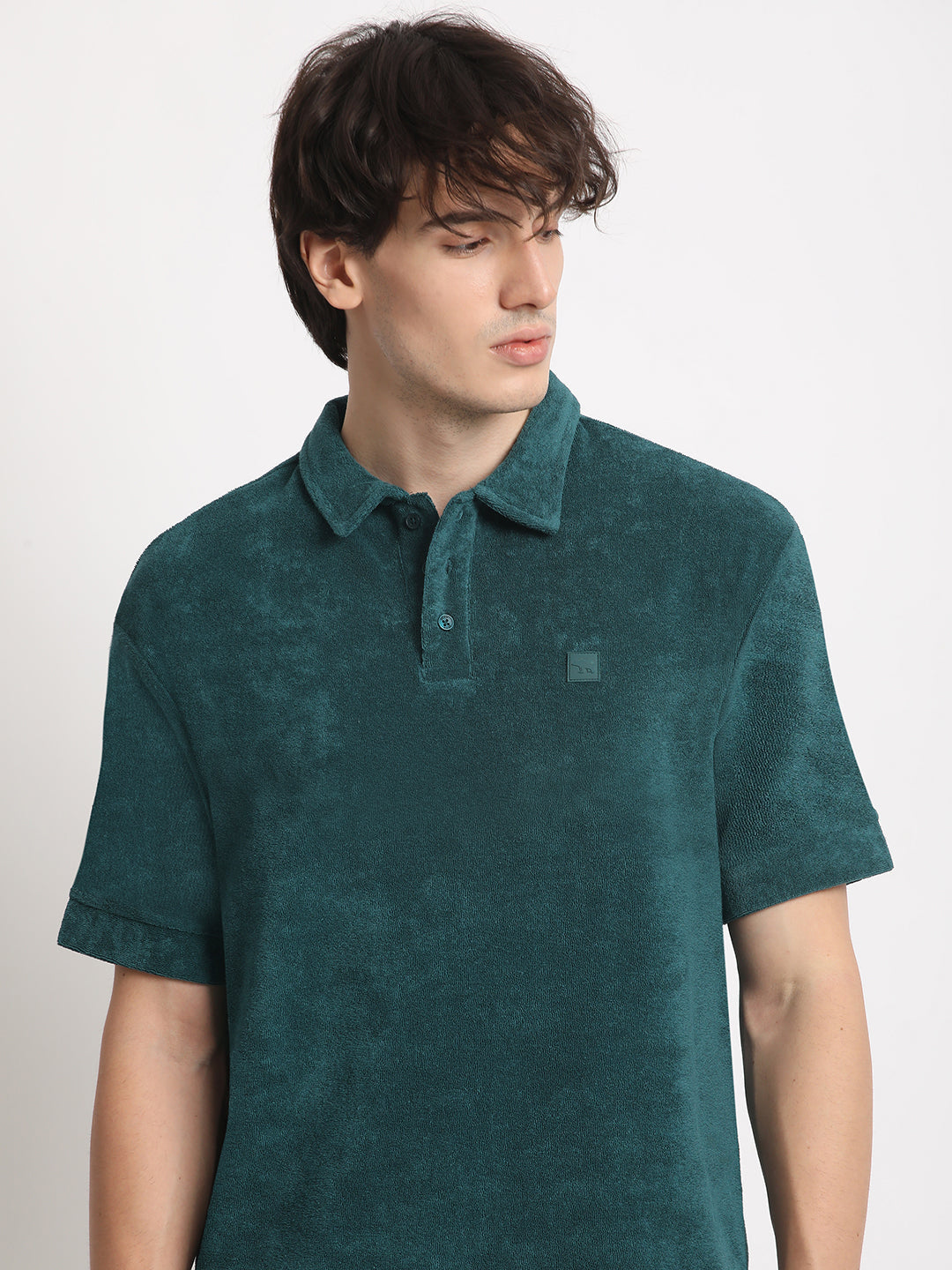 Men  Teal Solid Relaxed Fit Polo T-shirt