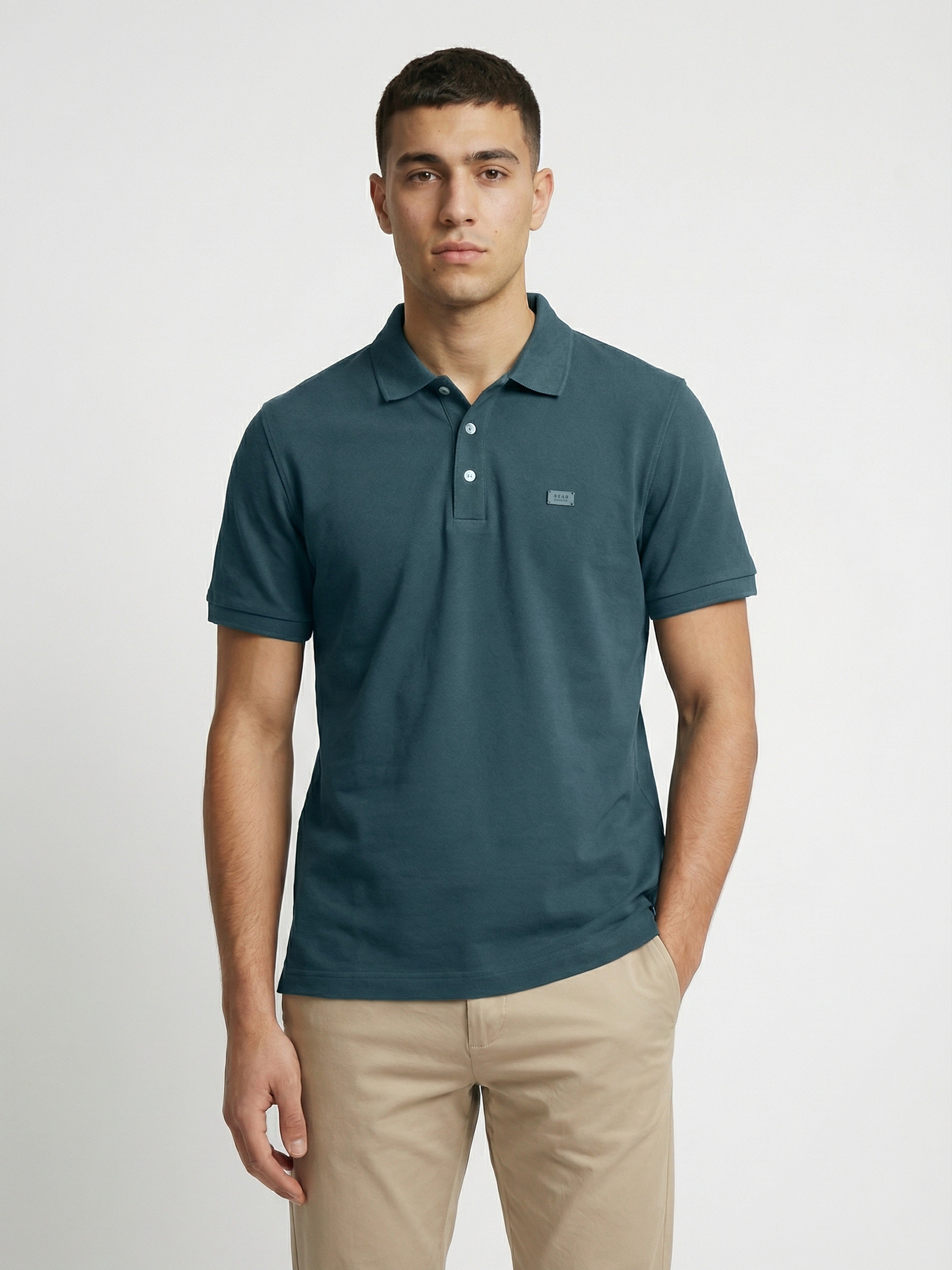 Men Green Solid Cotton Polo