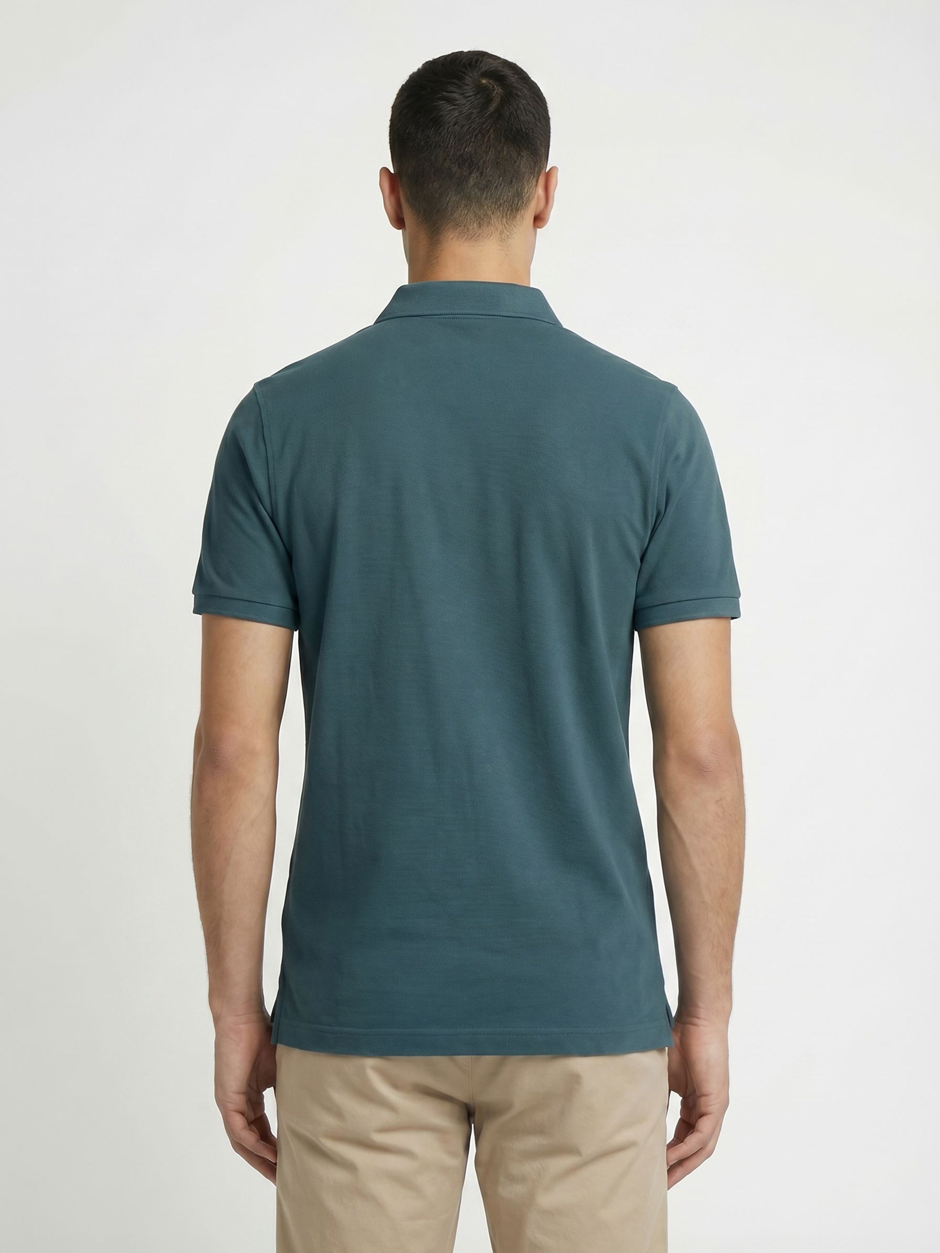 Men Green Solid Cotton Polo
