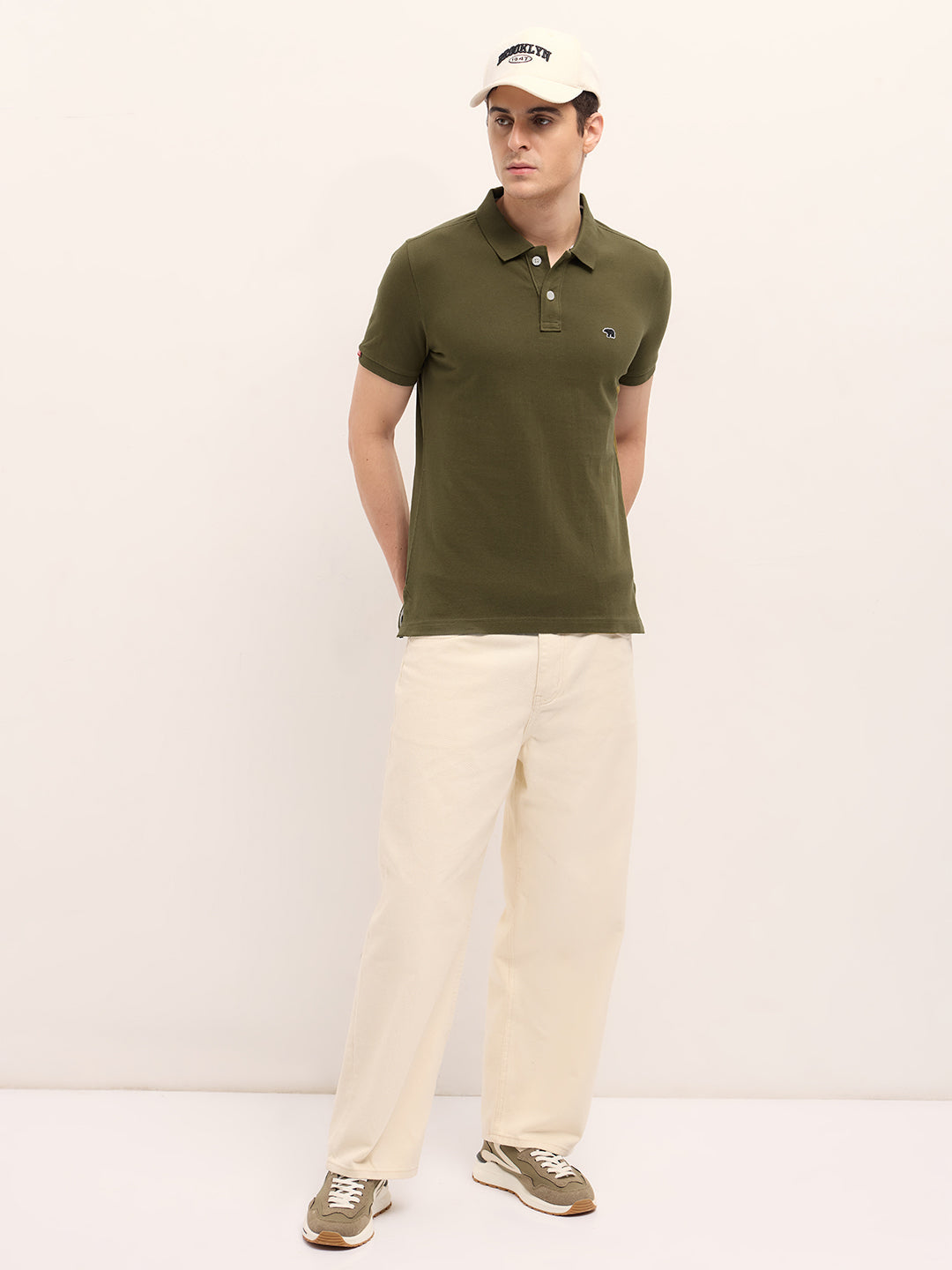 Men Dark Green Solid Regular Fit Polo