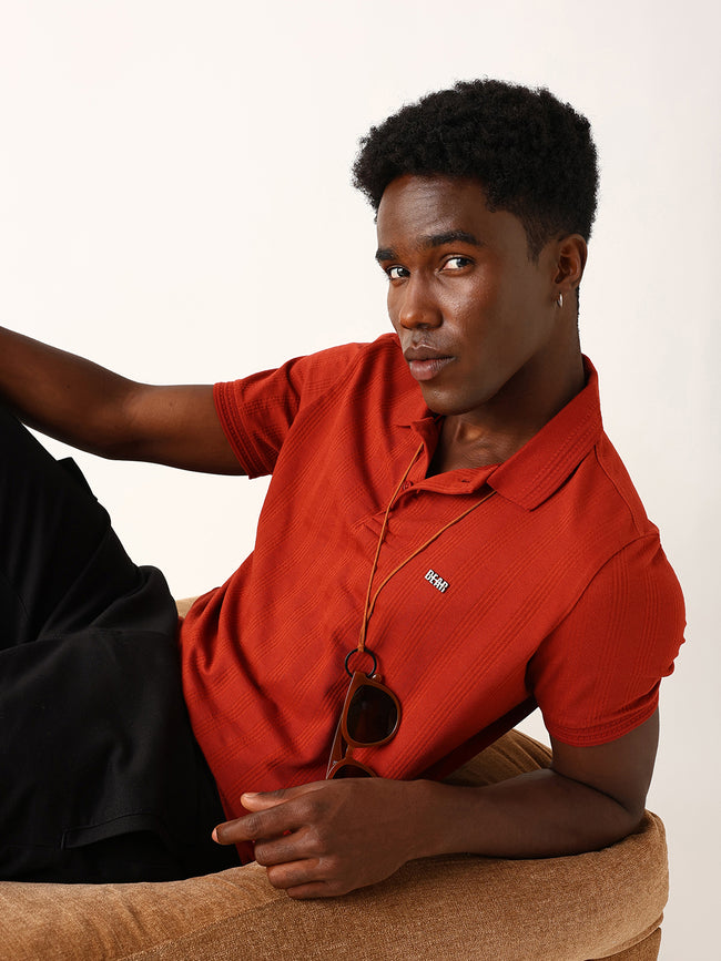 Men Red Self Design Cotton Polo