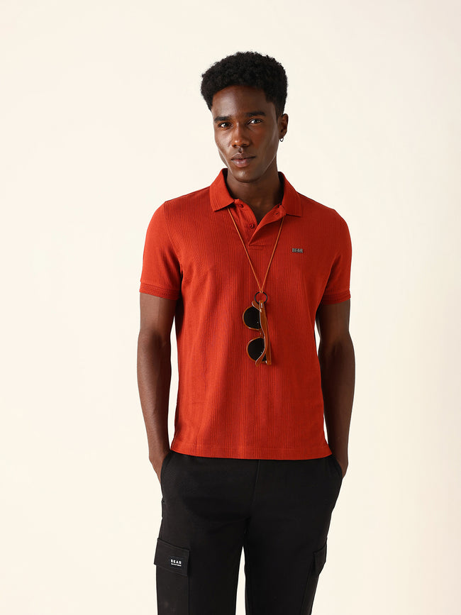 Men Red Self Design Cotton Polo