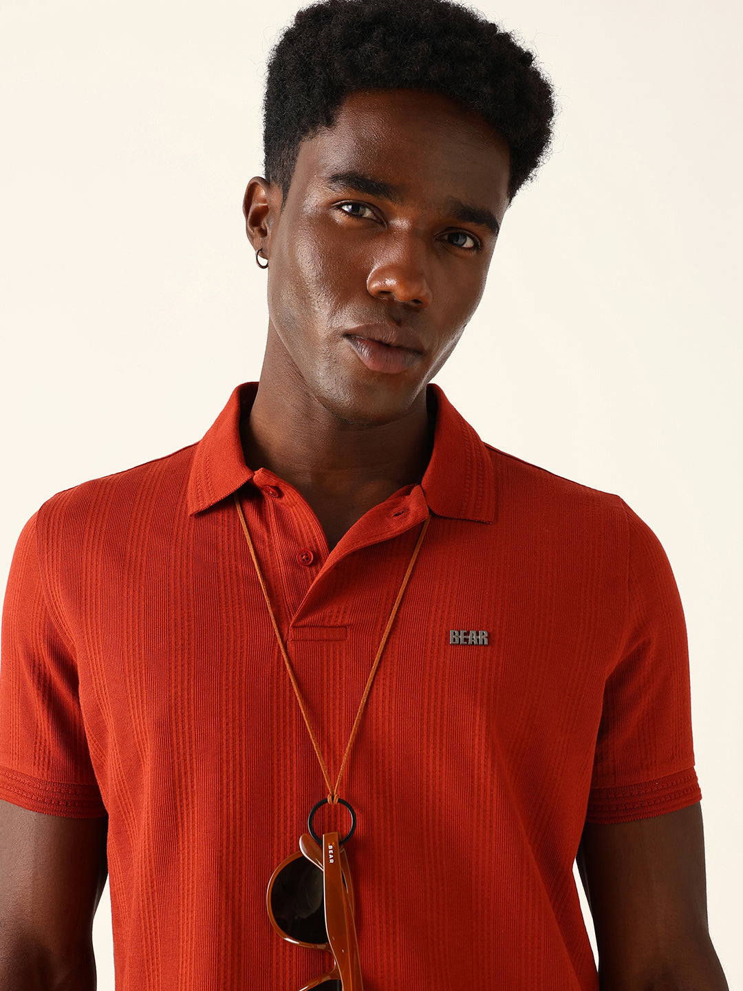 Men Red Self Design Cotton Polo