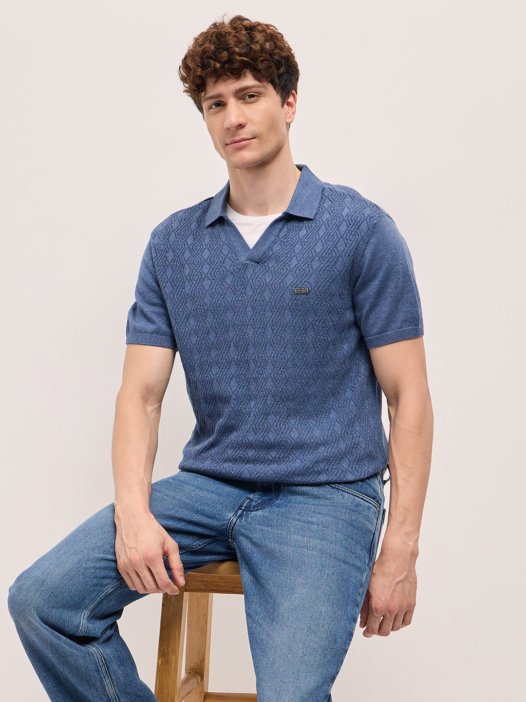 Men Blue Geometric textured Knit Slim Fit Polo
