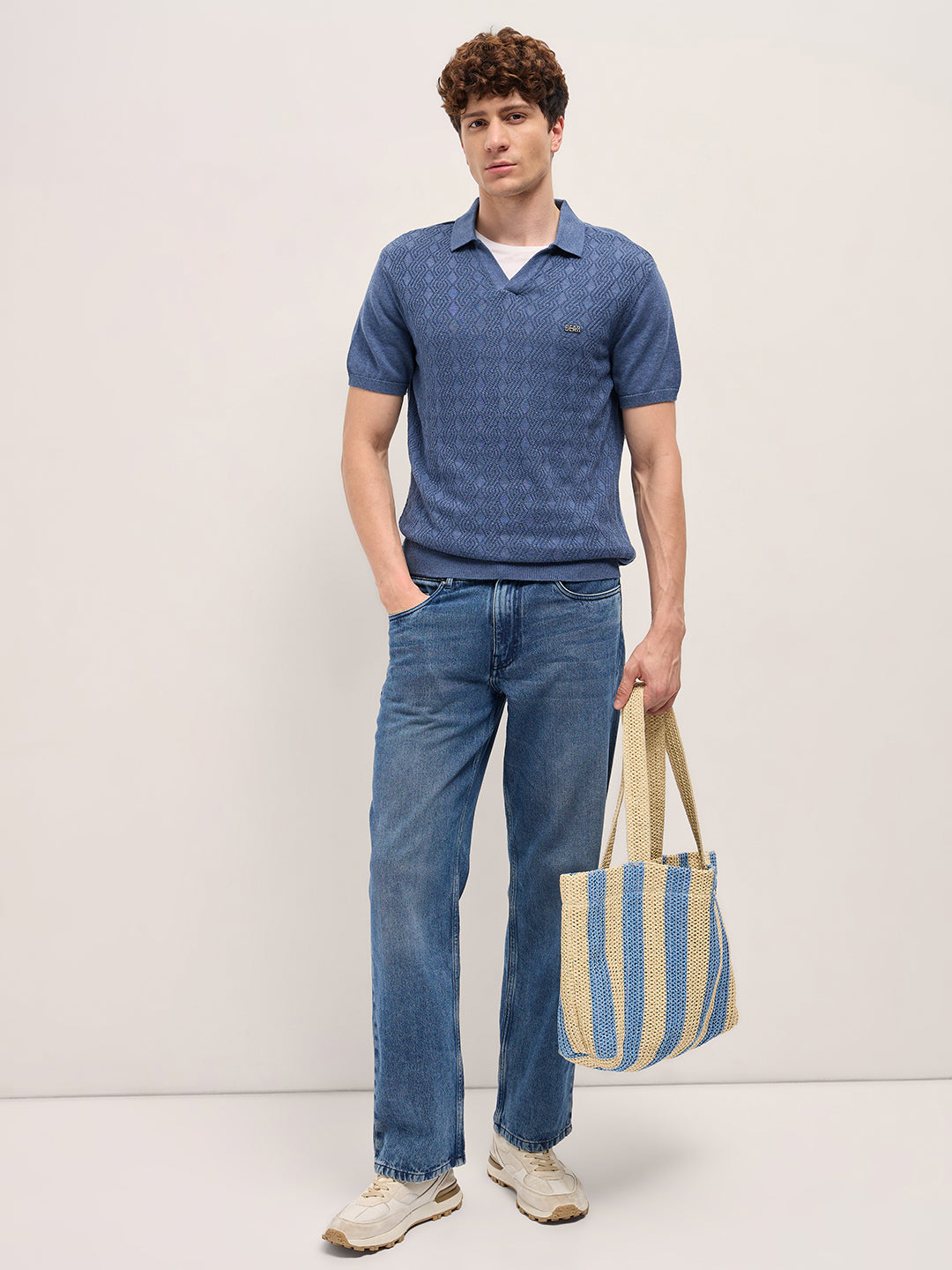 Men Blue Geometric textured Knit Slim Fit Polo