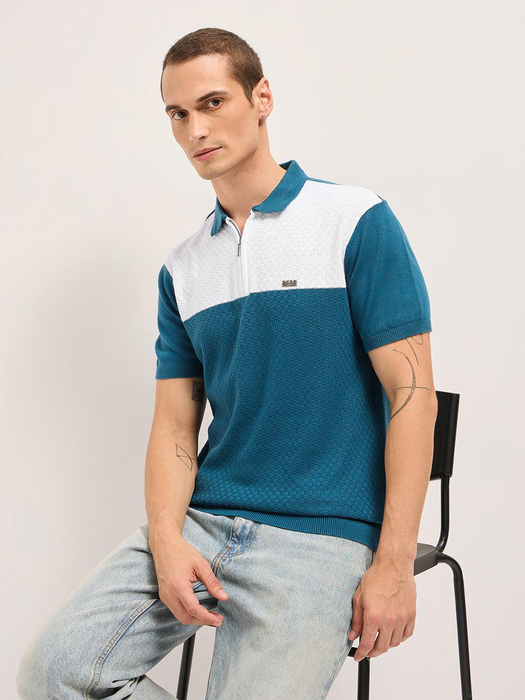 Men Blue Self Design Cotton Polo