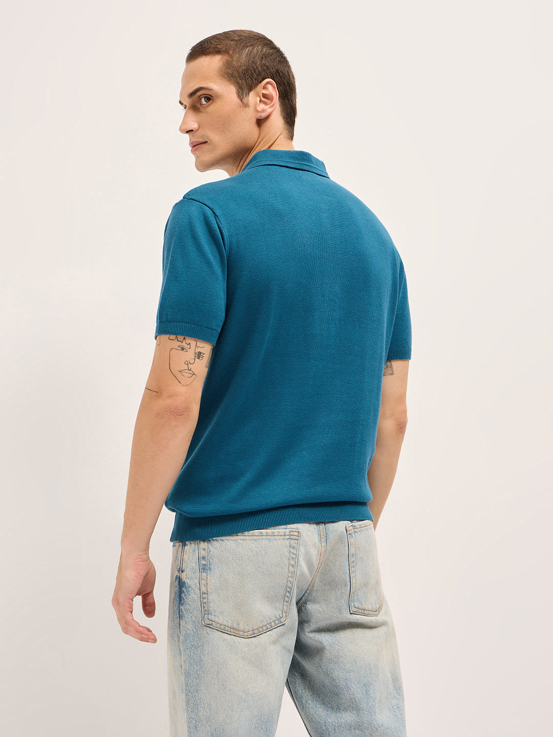 Men Blue Self Design Cotton Polo